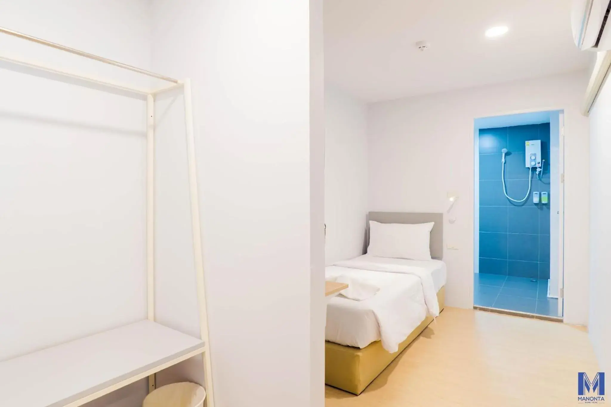 Bed in Manonta Budget Hotel Bed in Manonta Budget Hotel