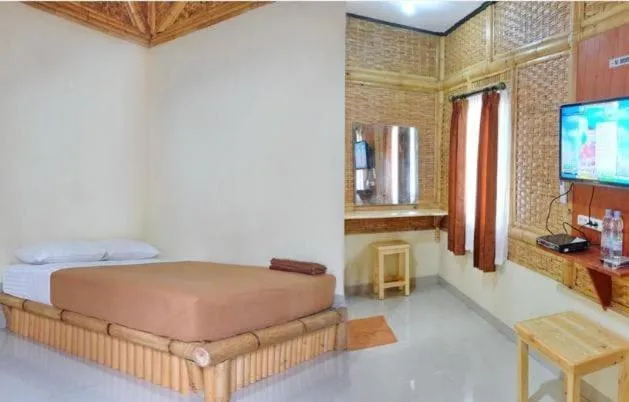 Bedroom, Bed in Hotel O Penginapan Putri Asih Sawarna