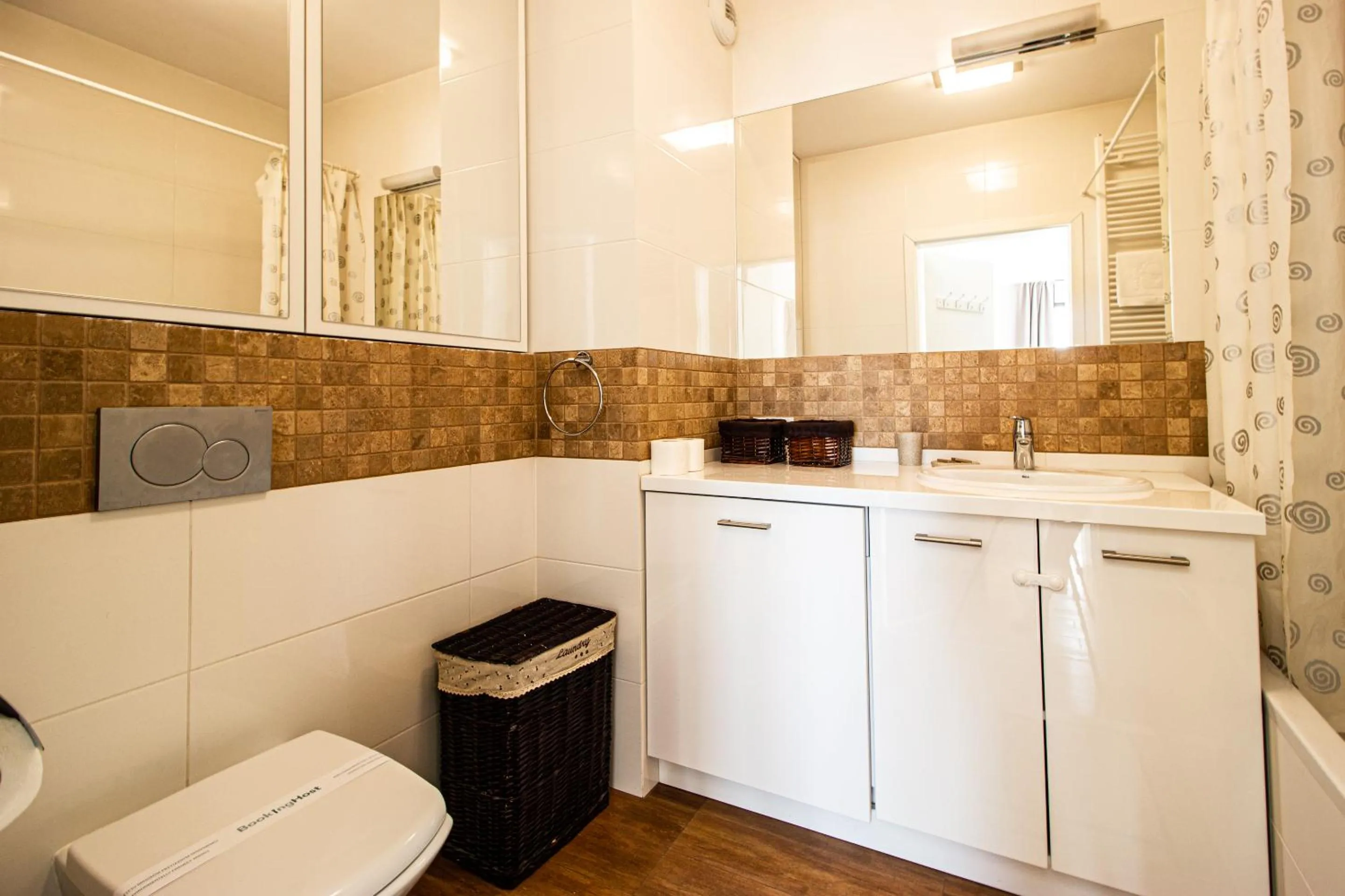 Toilet in Krasińskiego Żoliborz Stylish Apartment by BookingHost