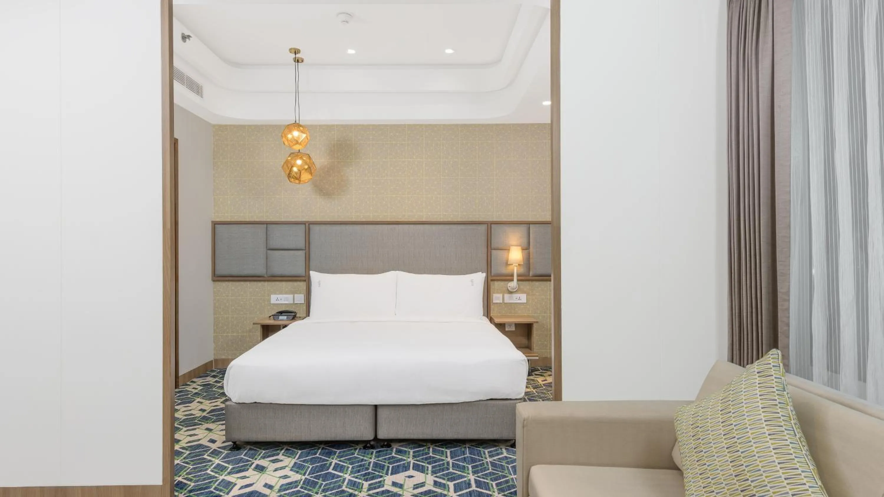 Bed in Holiday Inn Gurugram Sector 90 by IHG