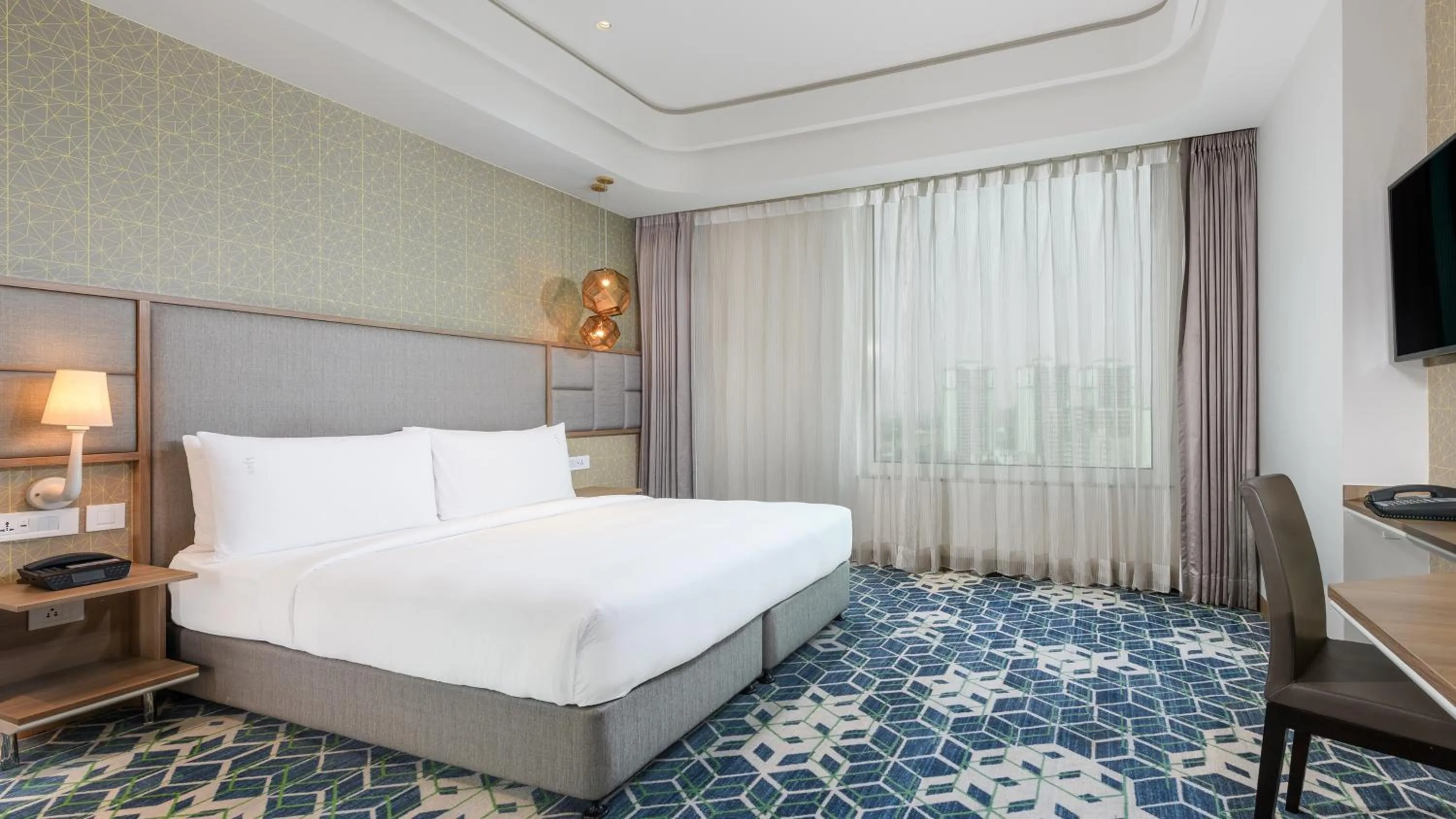 Bed in Holiday Inn Gurugram Sector 90 by IHG