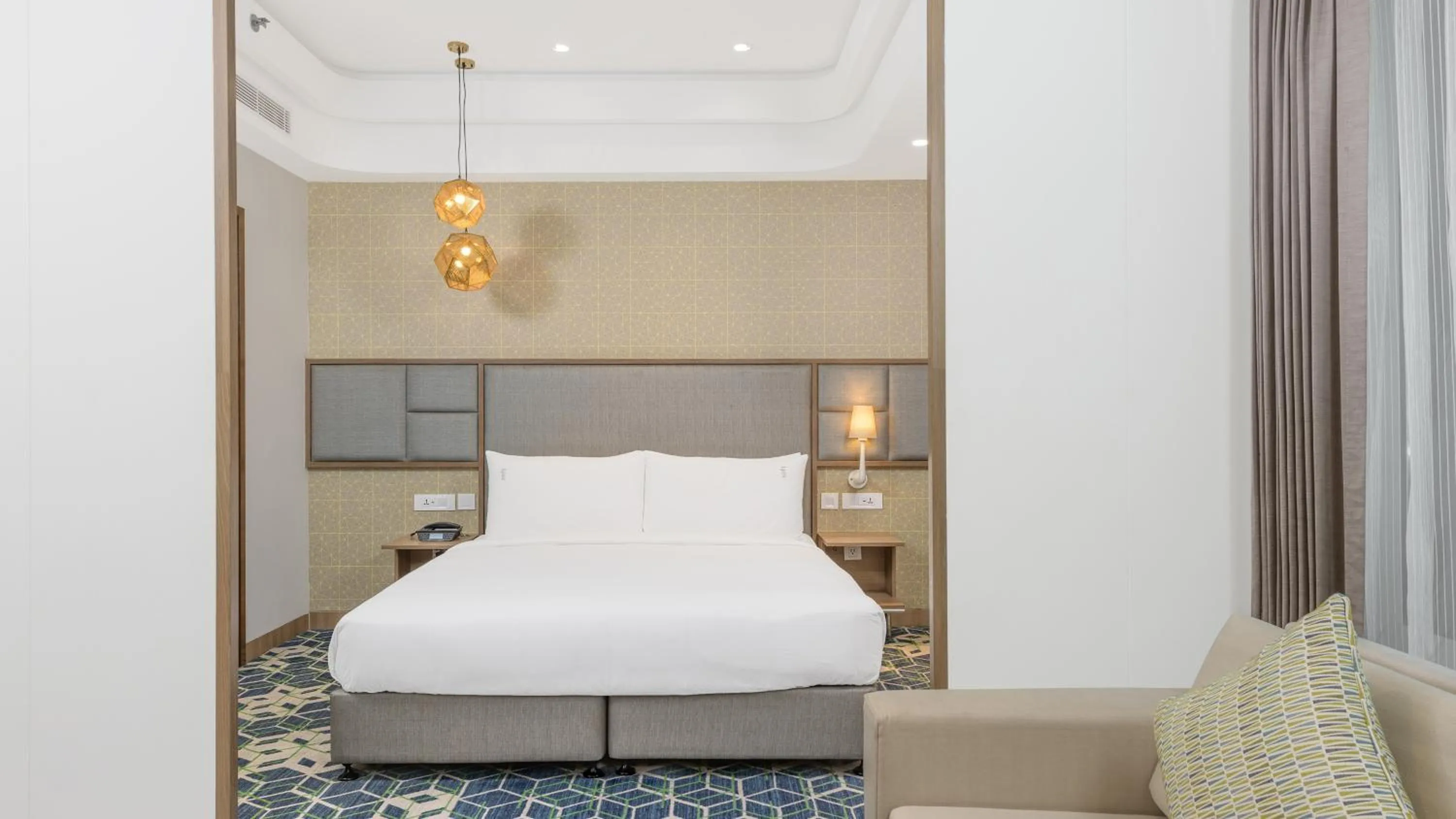 Bed in Holiday Inn Gurugram Sector 90 by IHG