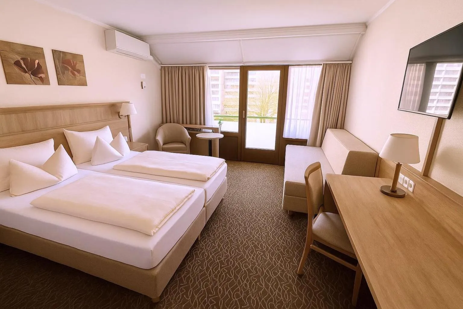 Bed in AMBER HOTEL Bavaria Superior