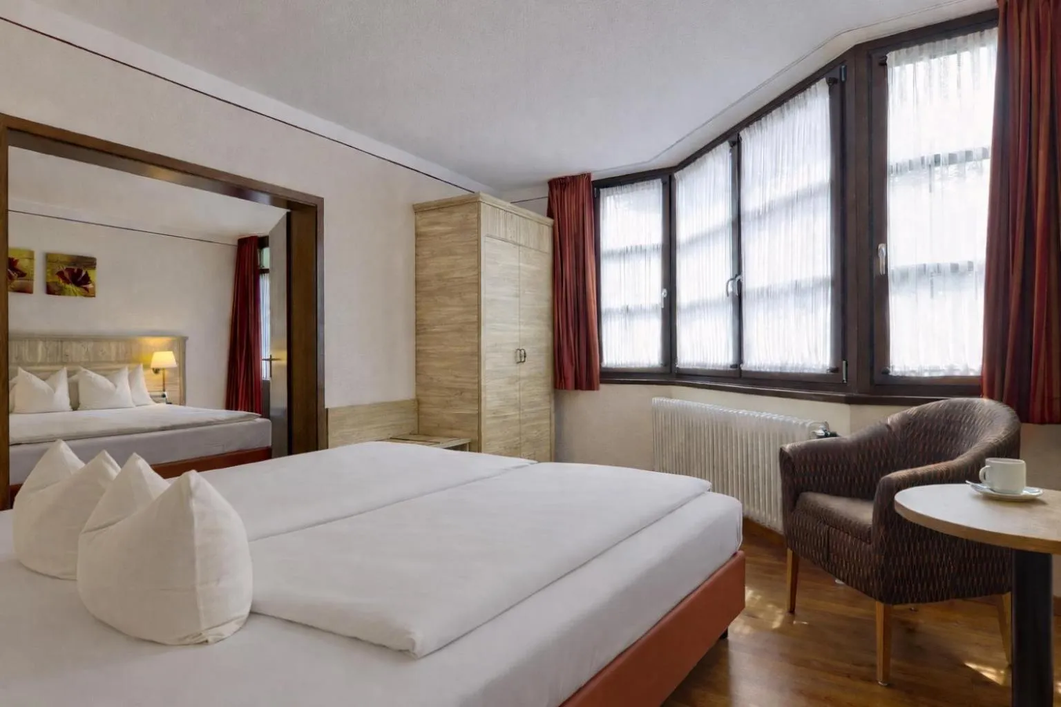 Bedroom, Bed in AMBER HOTEL Bavaria Superior