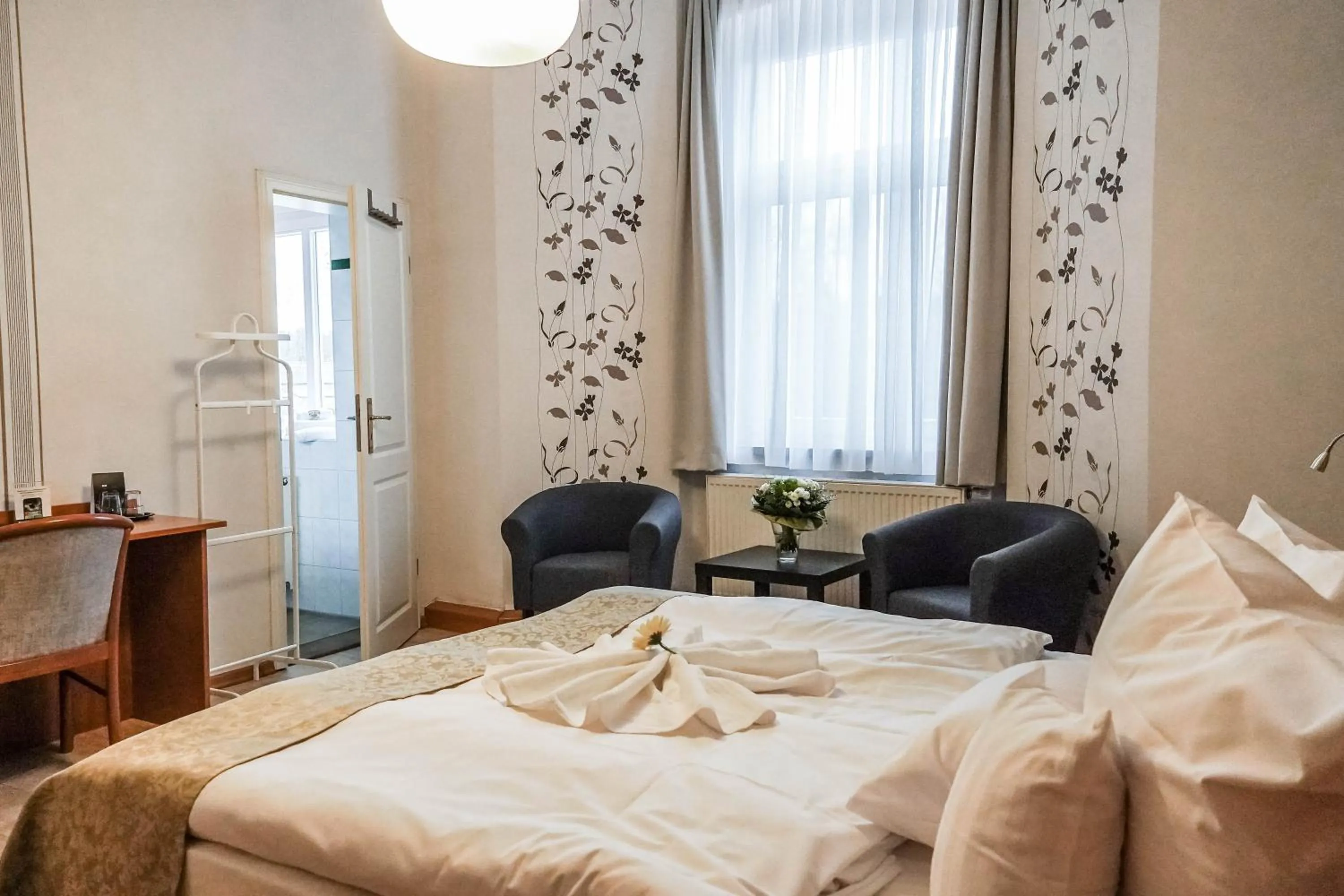 Photo of the whole room, Bed in Wellness- & Sporthotel Haus am See