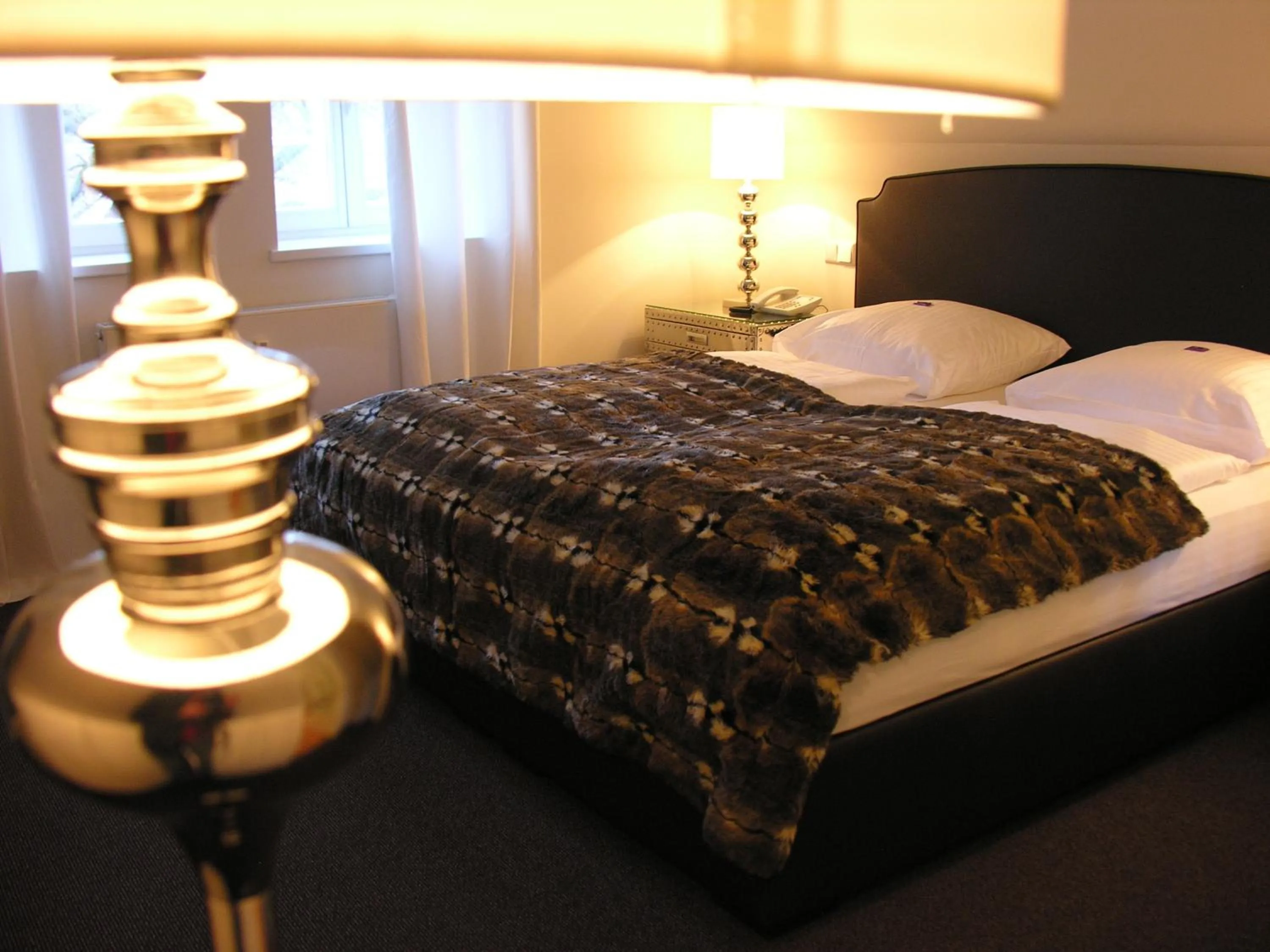 Decorative detail, Bed in Hotel am Doktorplatz