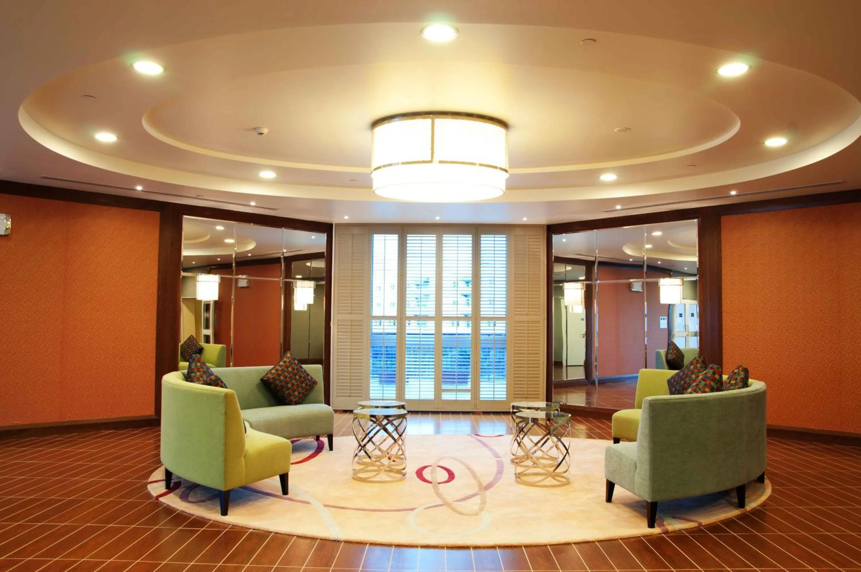 Communal lounge/ TV room in Salalah Gardens Hotel Managed by Safir Hotels & Resorts