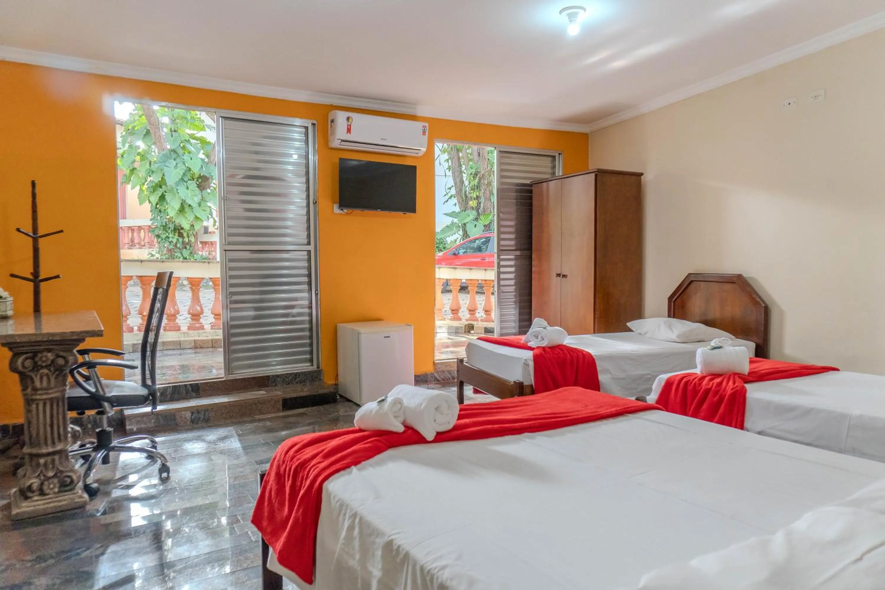 Quadruple Room with Balcony - single occupancy in Hotel Estancia Santa Amélia