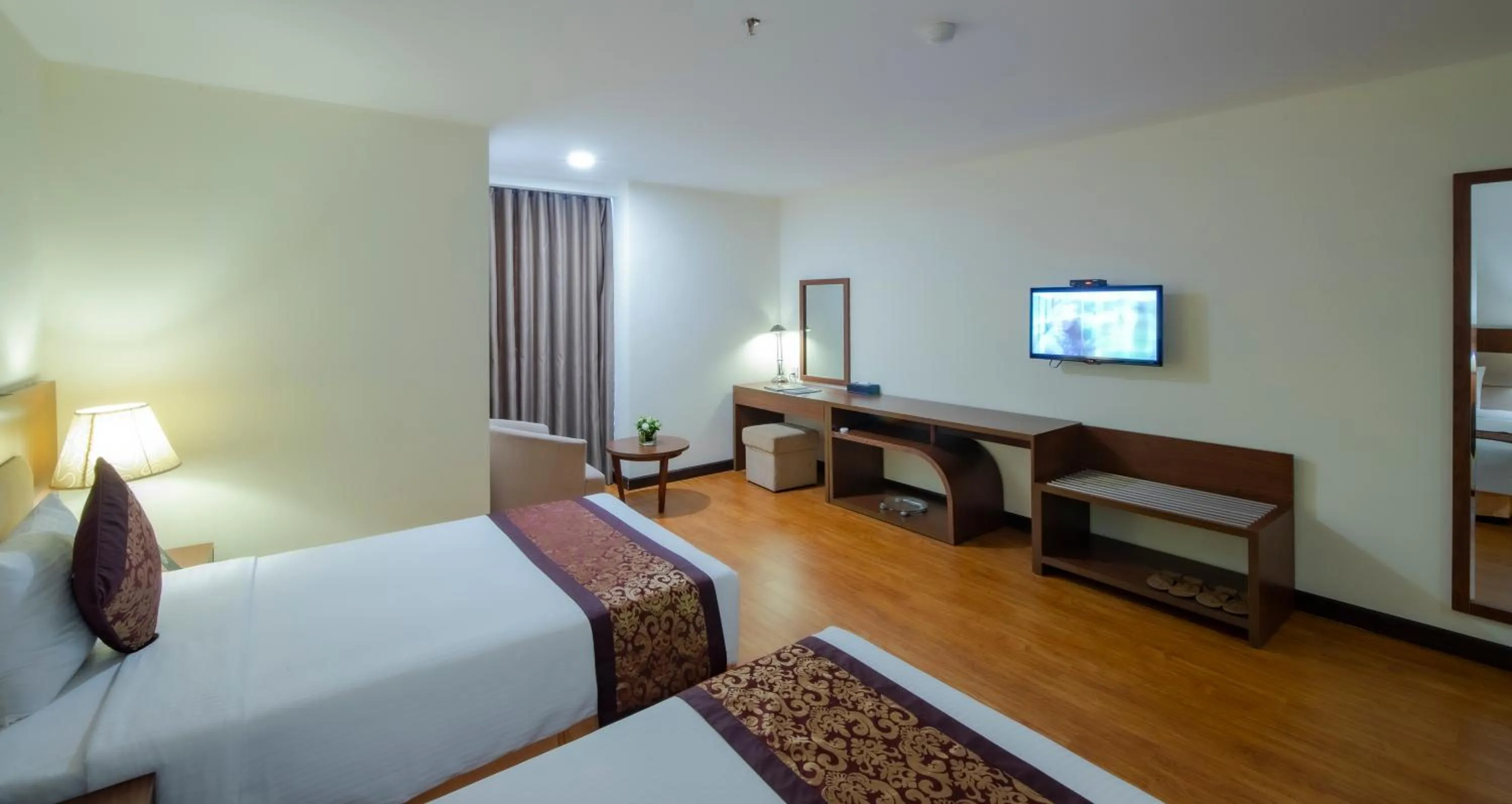 Communal lounge/ TV room, Bed in Muong Thanh Grand Da Nang Hotel