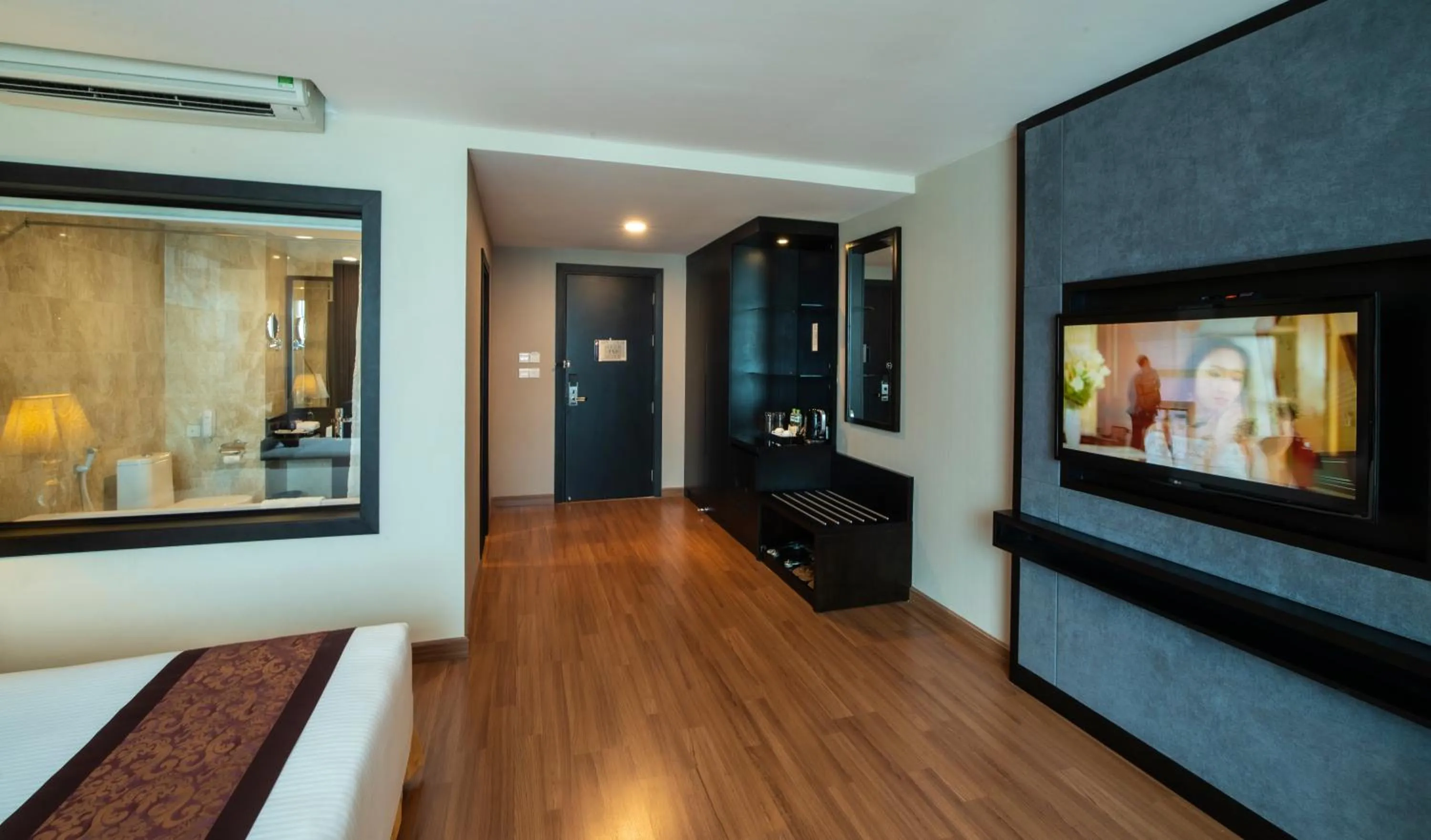 Communal lounge/ TV room, Bed in Muong Thanh Grand Da Nang Hotel