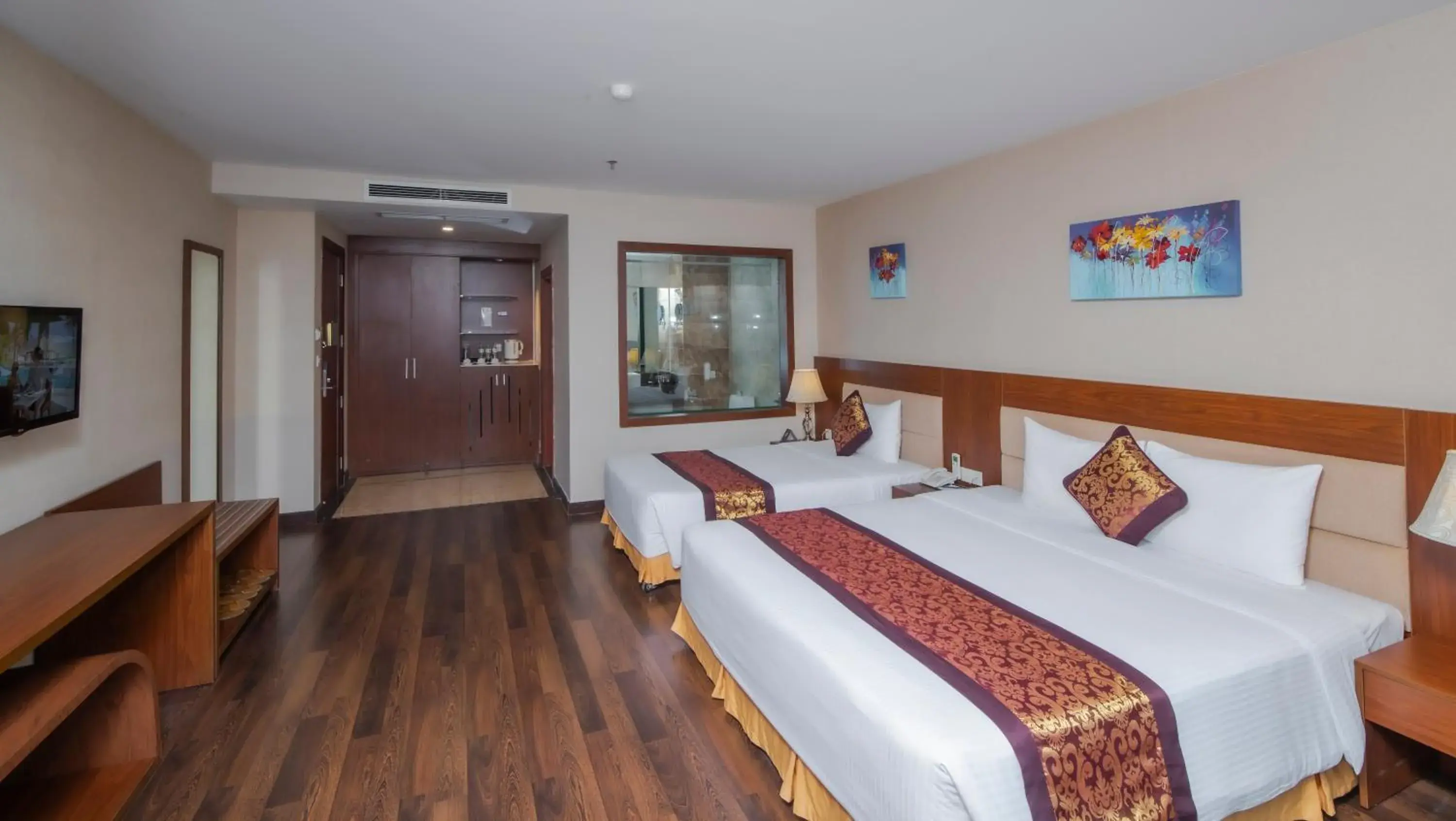 Deluxe Family Triple Room with Partial River View in Muong Thanh Grand Da Nang Hotel Deluxe Family Triple Room with Partial River View in Muong Thanh Grand Da Nang Hotel