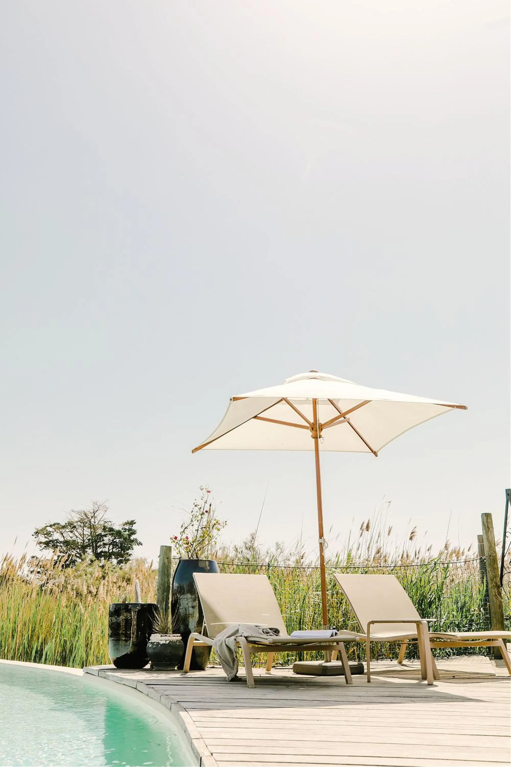 Swimming pool in Hôtel Restaurant Les Arnelles