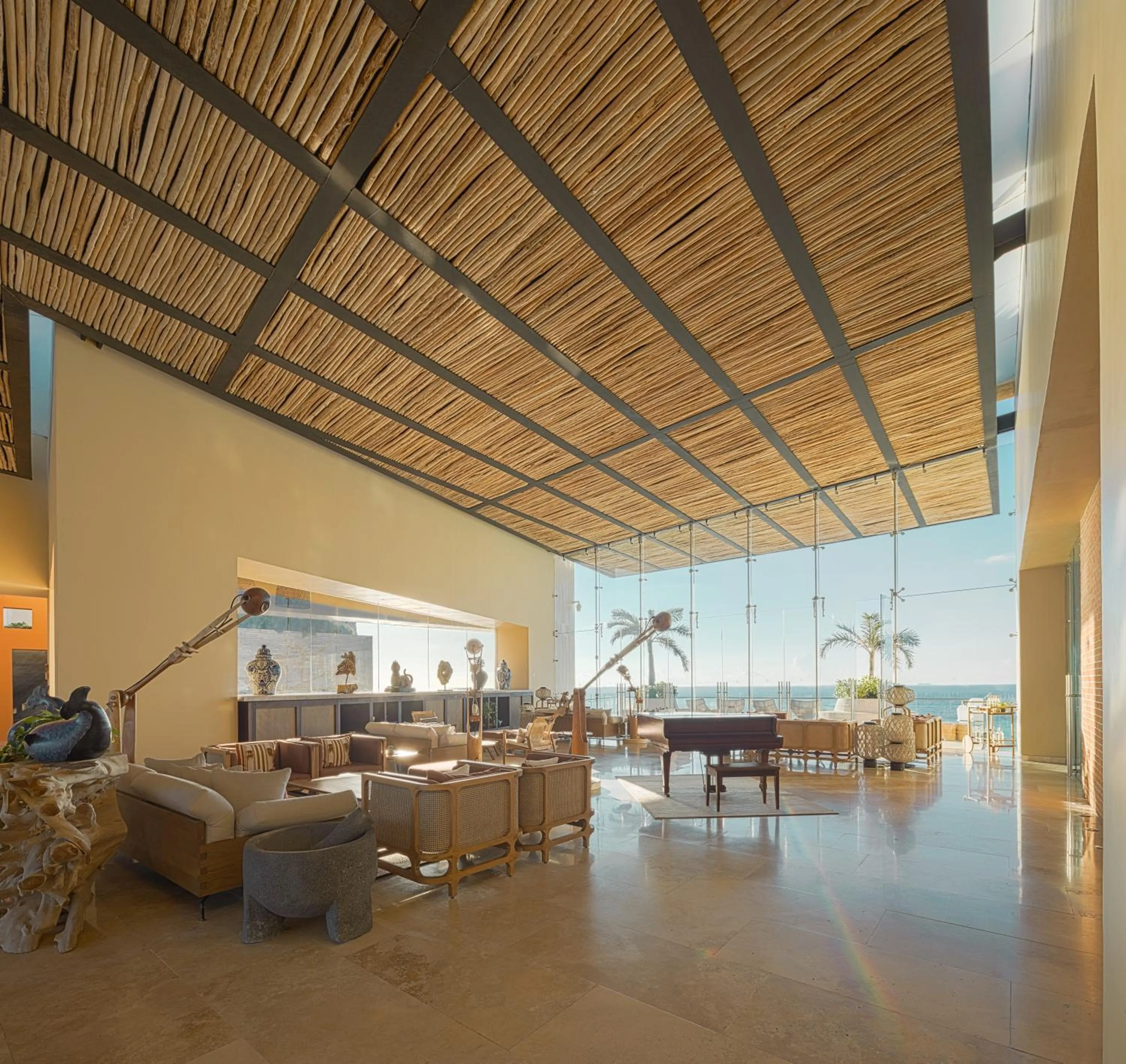 Living room in La Casa de la Playa by Xcaret- All Inclusive Adults Only