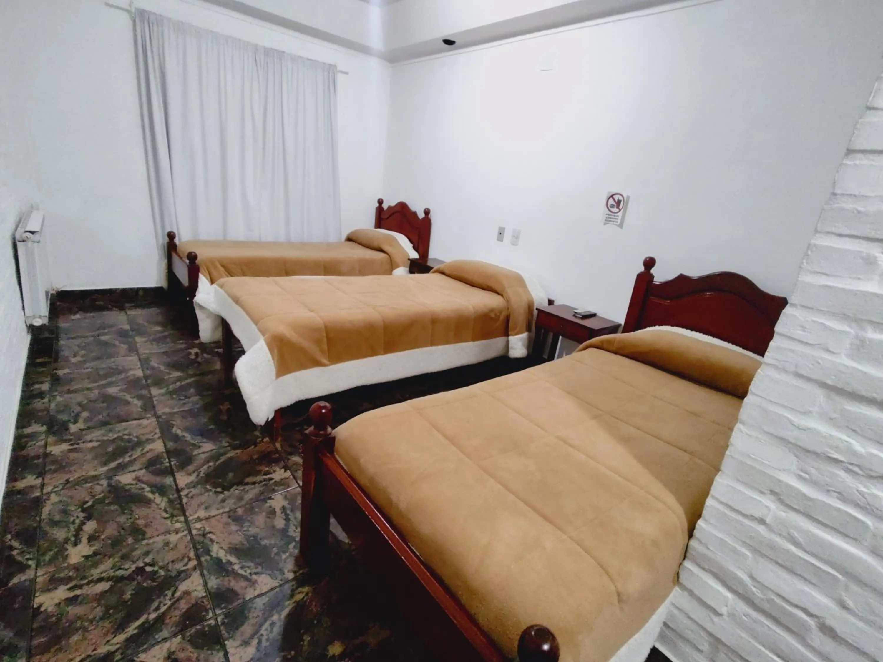 Bed in Hosteria Los Cuartos