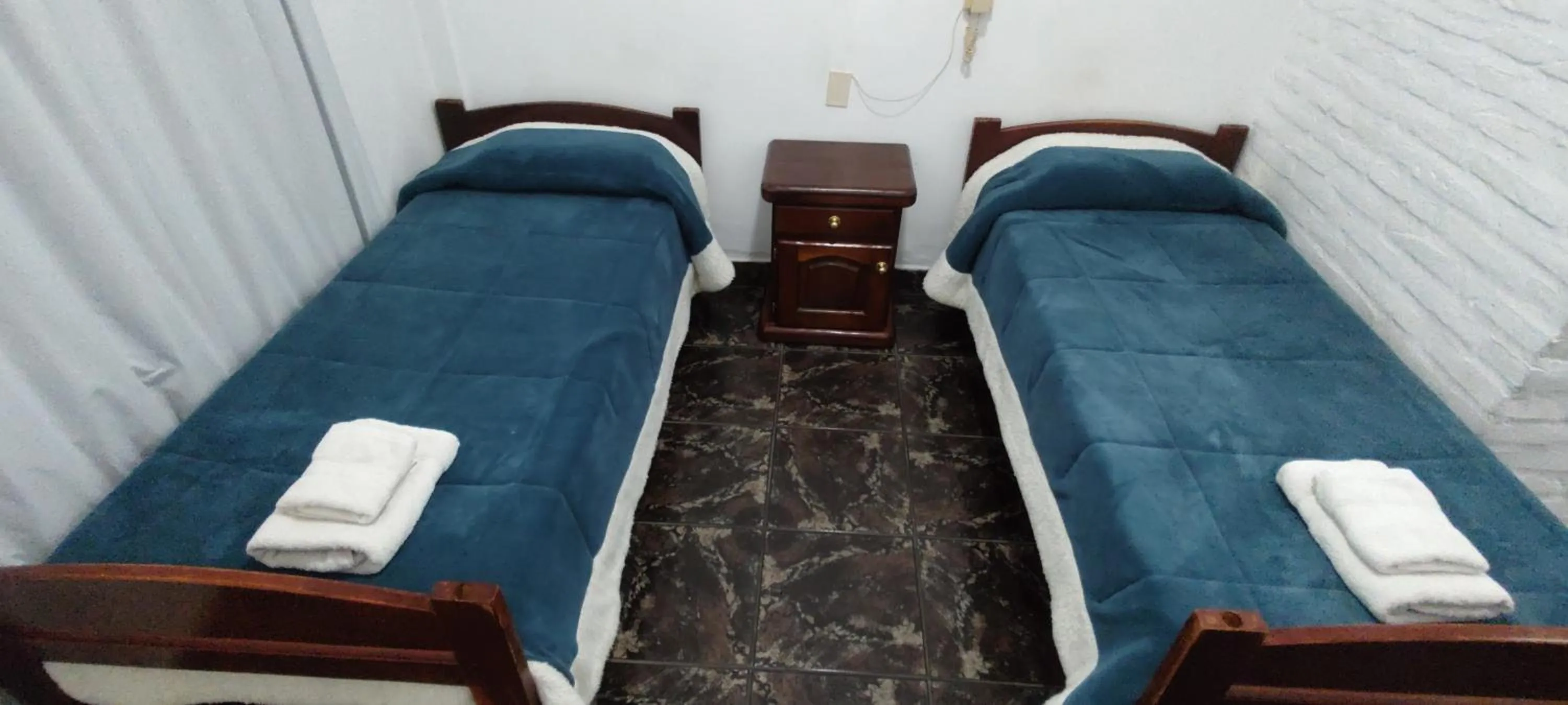 Bed in Hosteria Los Cuartos