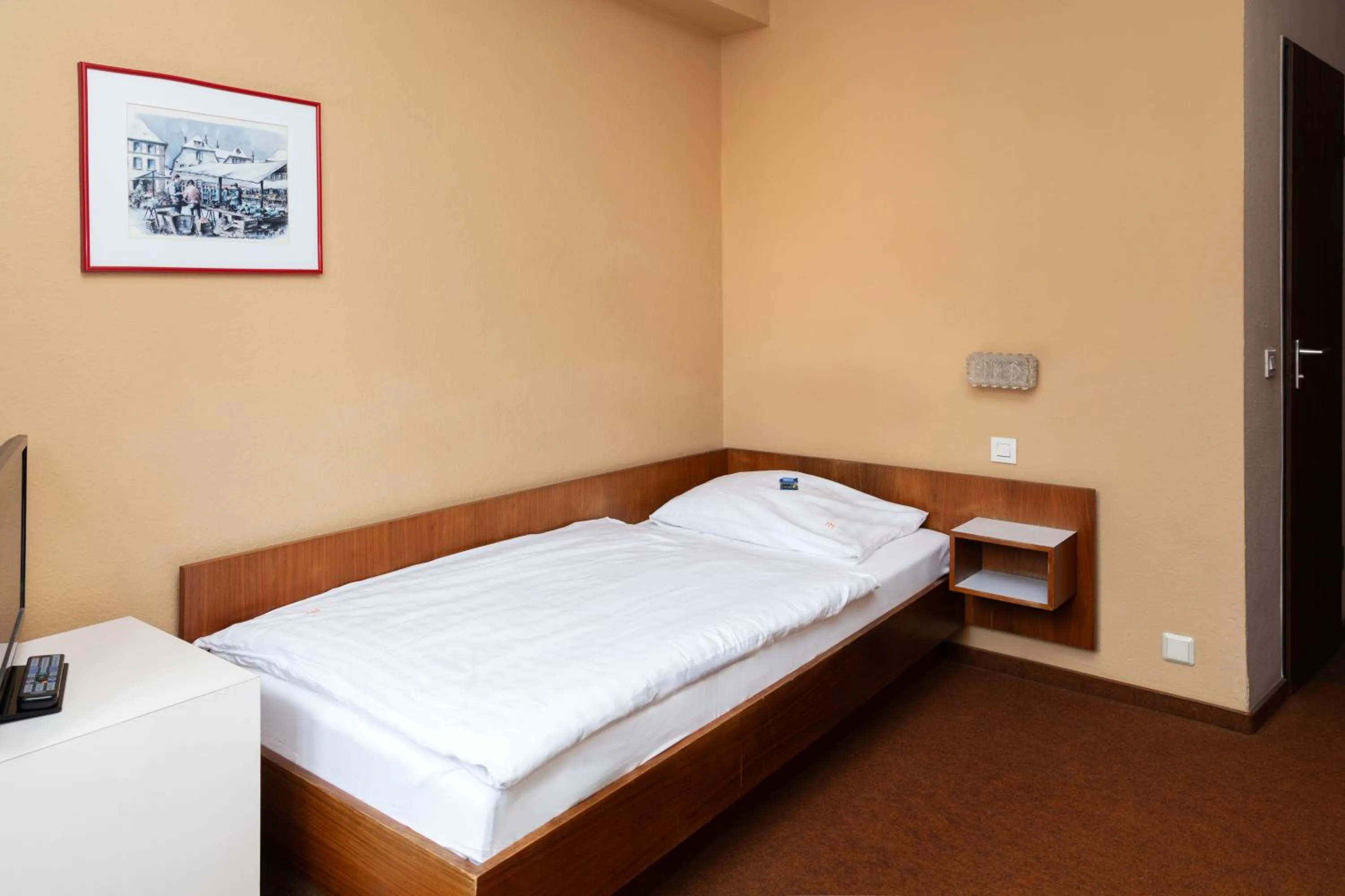 Bed in Hotel Meran Hallenbad & Sauna