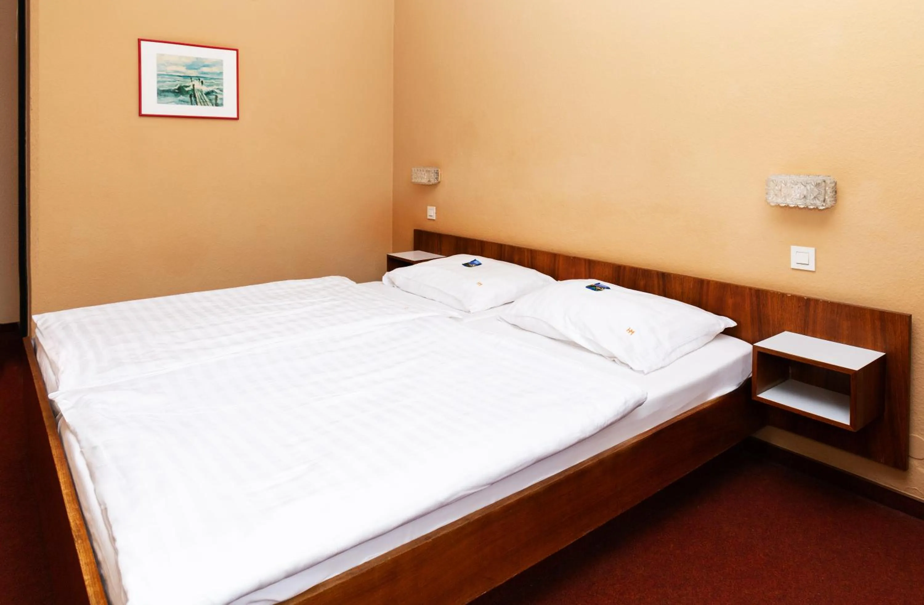 Bed in Hotel Meran Hallenbad & Sauna