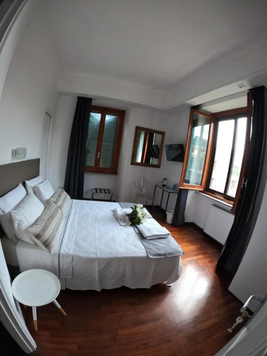 Photo of the whole room, Bed in EMI's Guest House