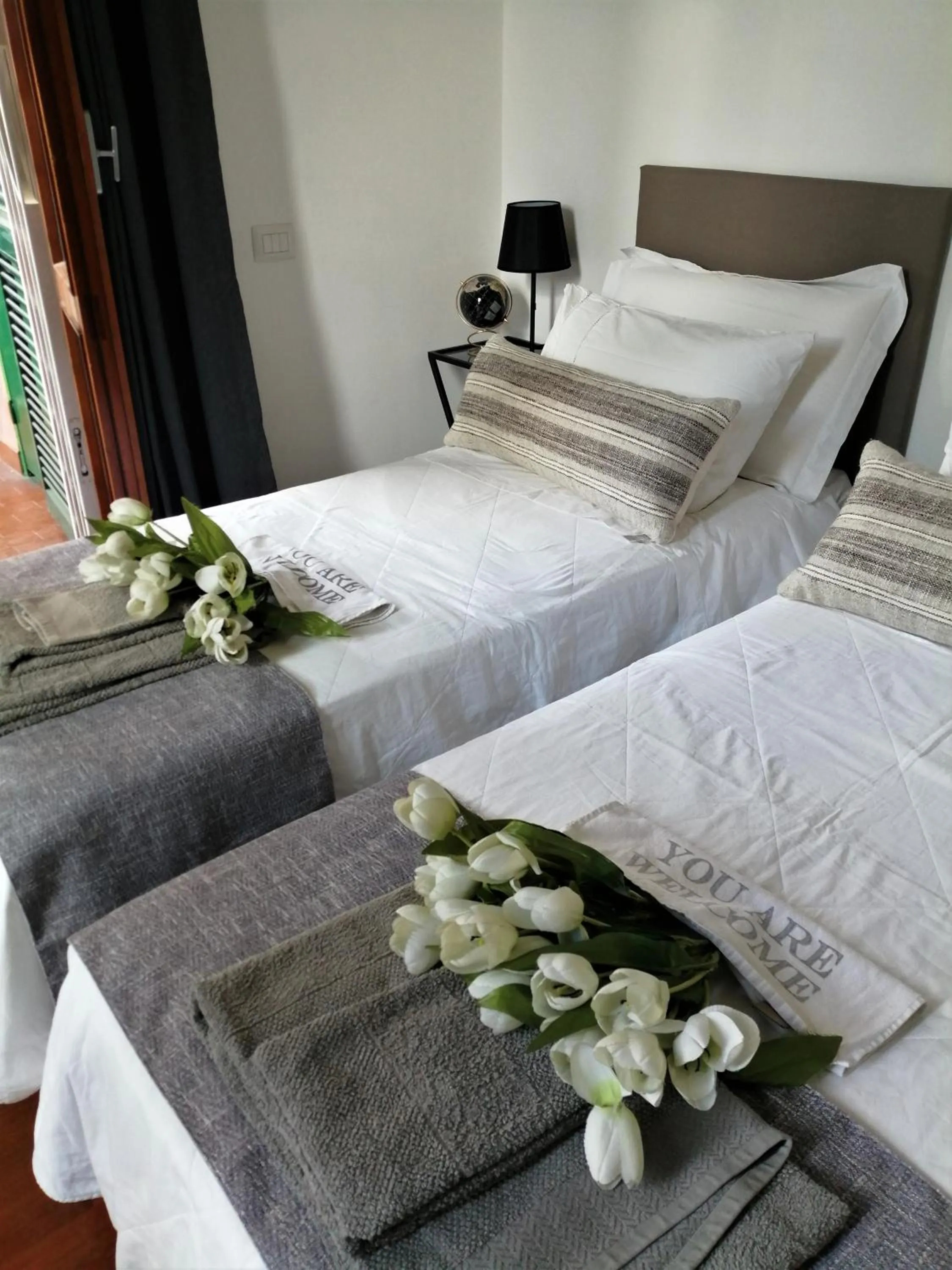 Photo of the whole room, Bed in EMI's Guest House