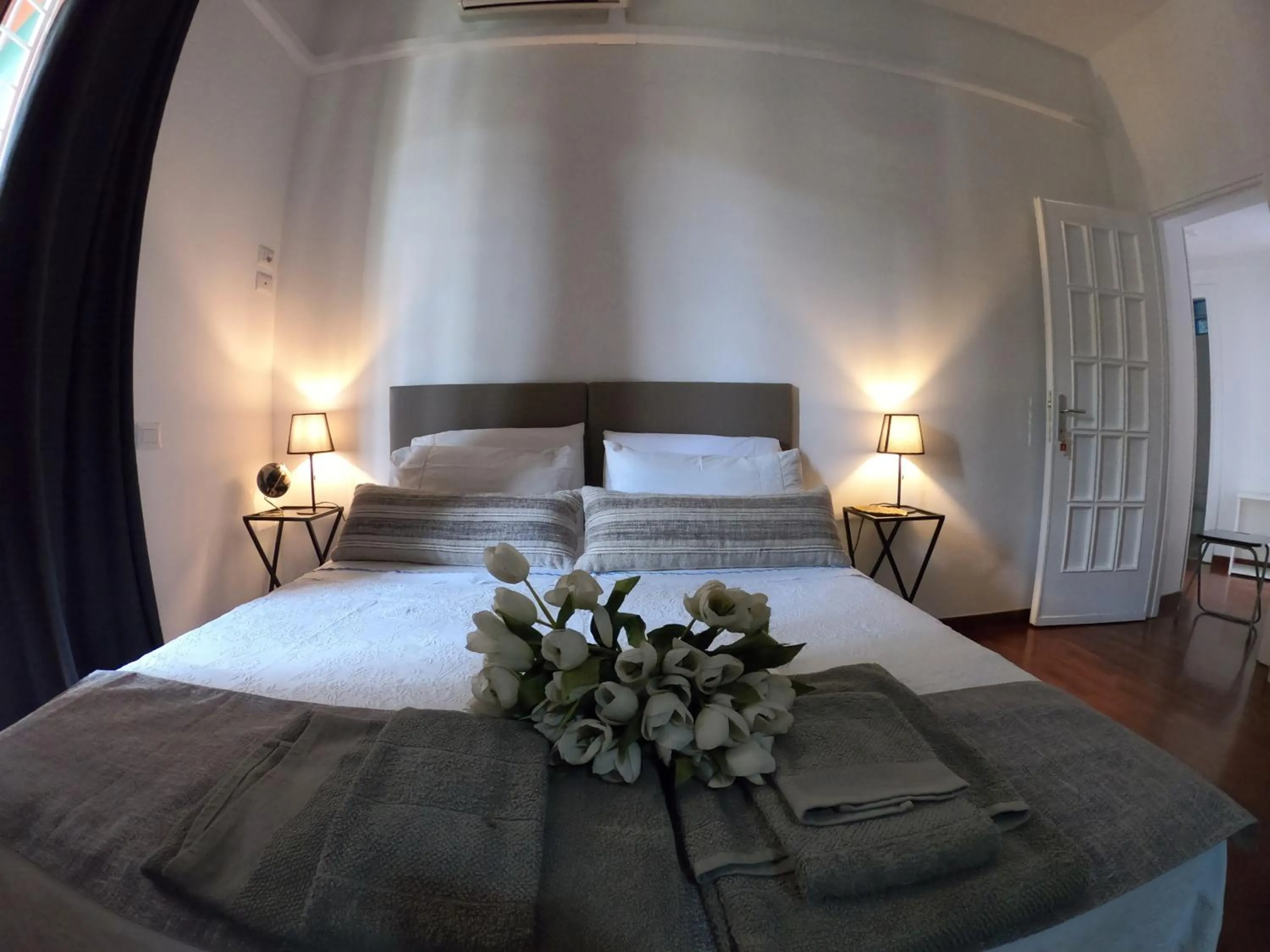 Photo of the whole room, Bed in EMI's Guest House