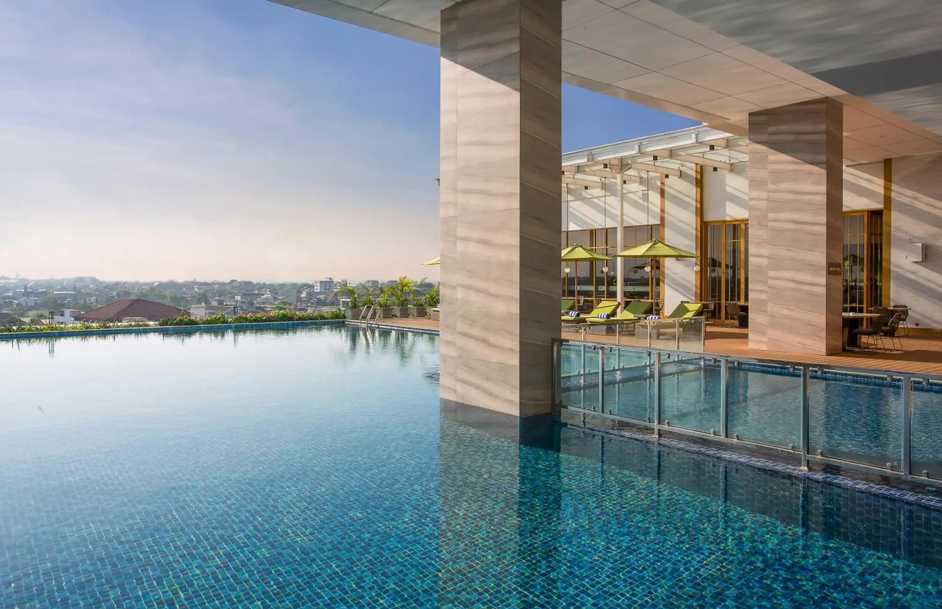 Swimming pool in Swiss-Belhotel Solo Swimming pool in Swiss-Belhotel Solo