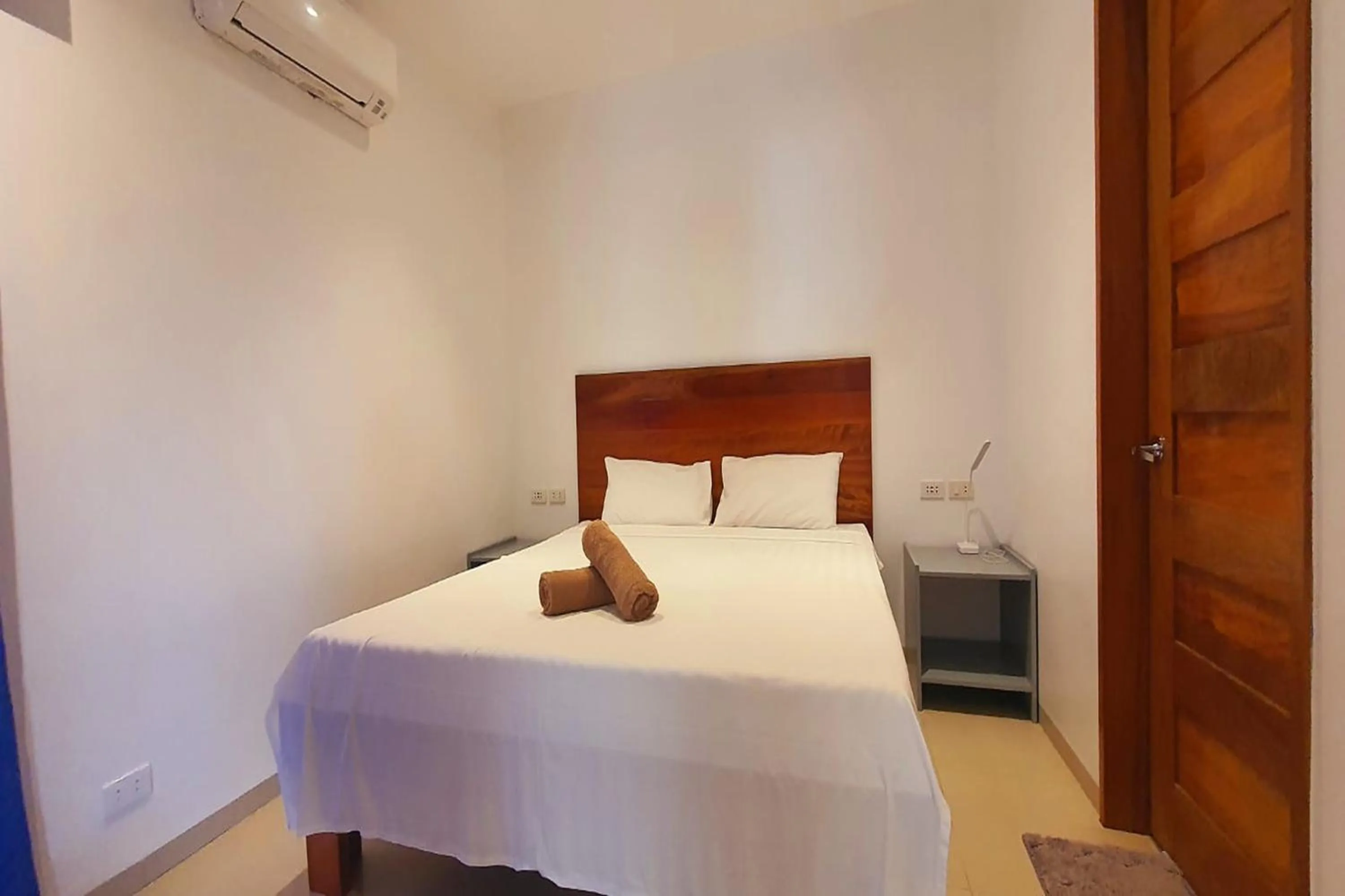 Bedroom, Bed in Pili Beach Resort Agmanic