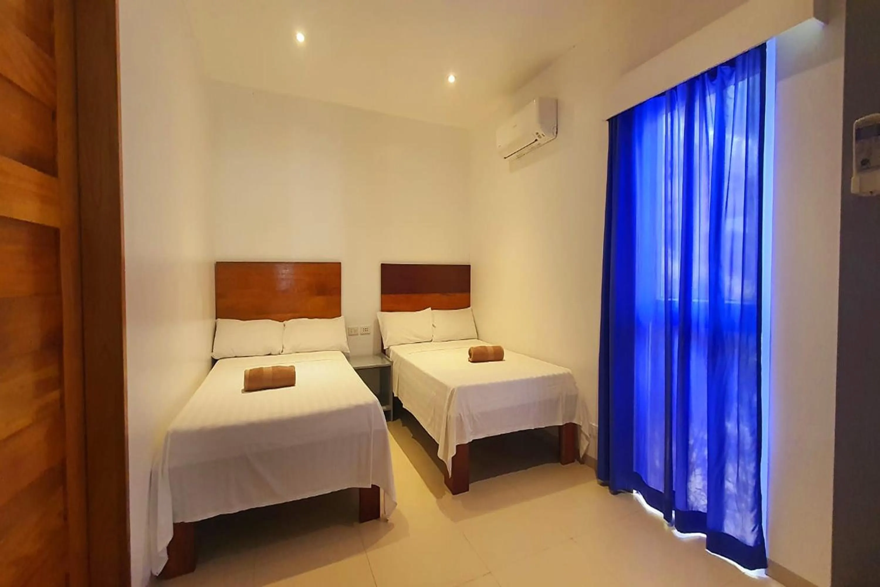 Bedroom, Bed in Pili Beach Resort Agmanic