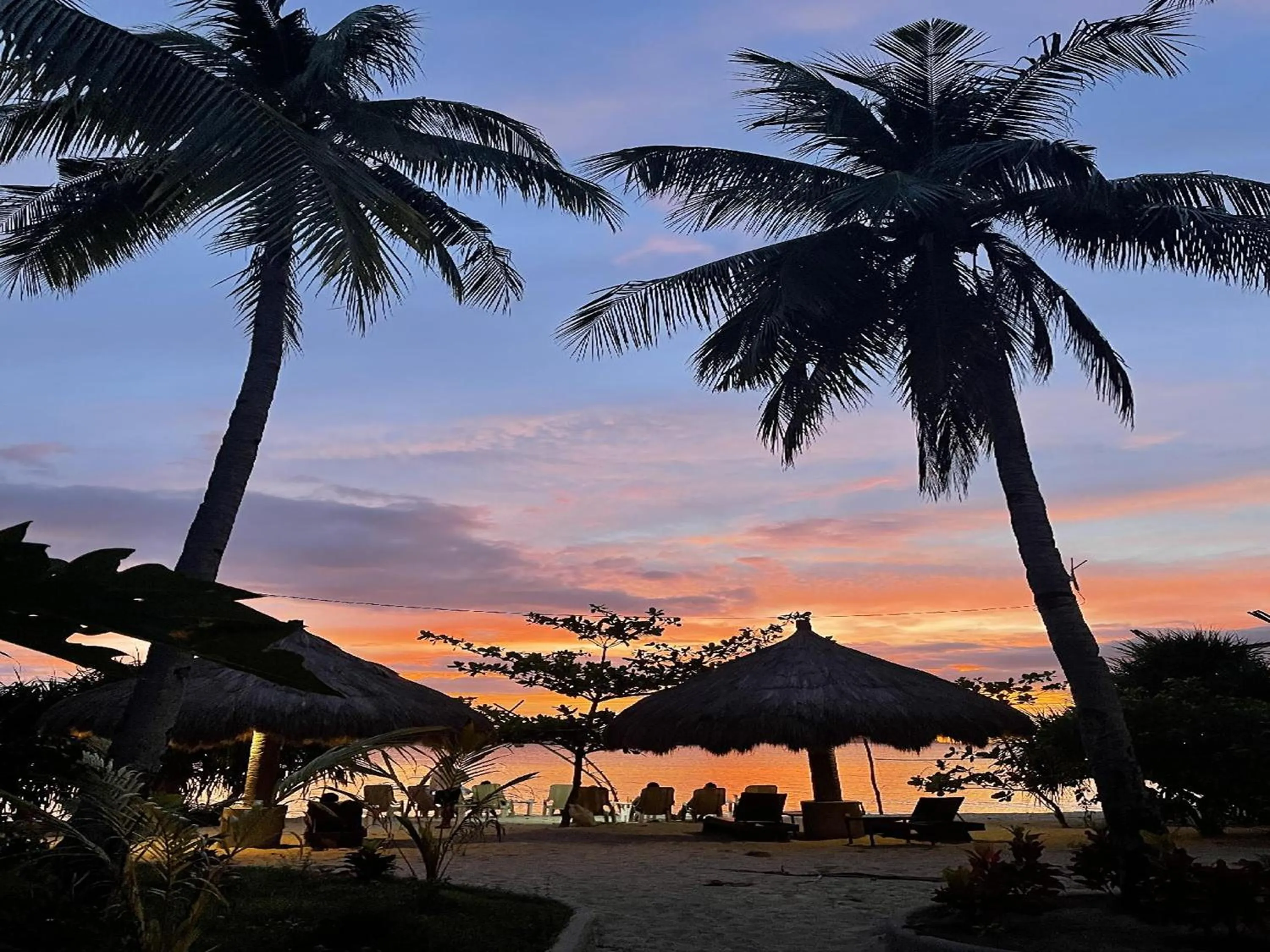 Sunset in Pili Beach Resort Agmanic