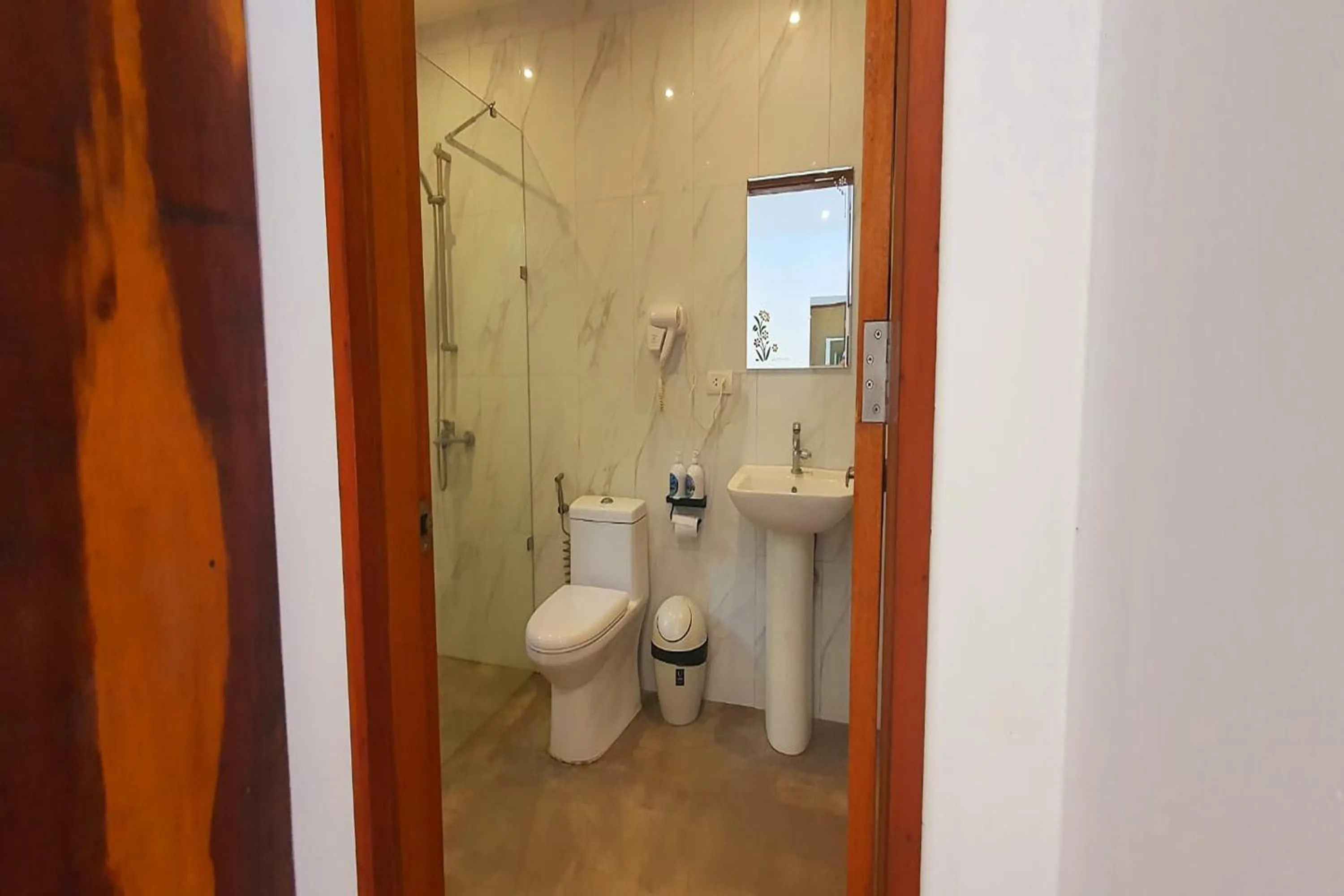 Bathroom in Pili Beach Resort Agmanic