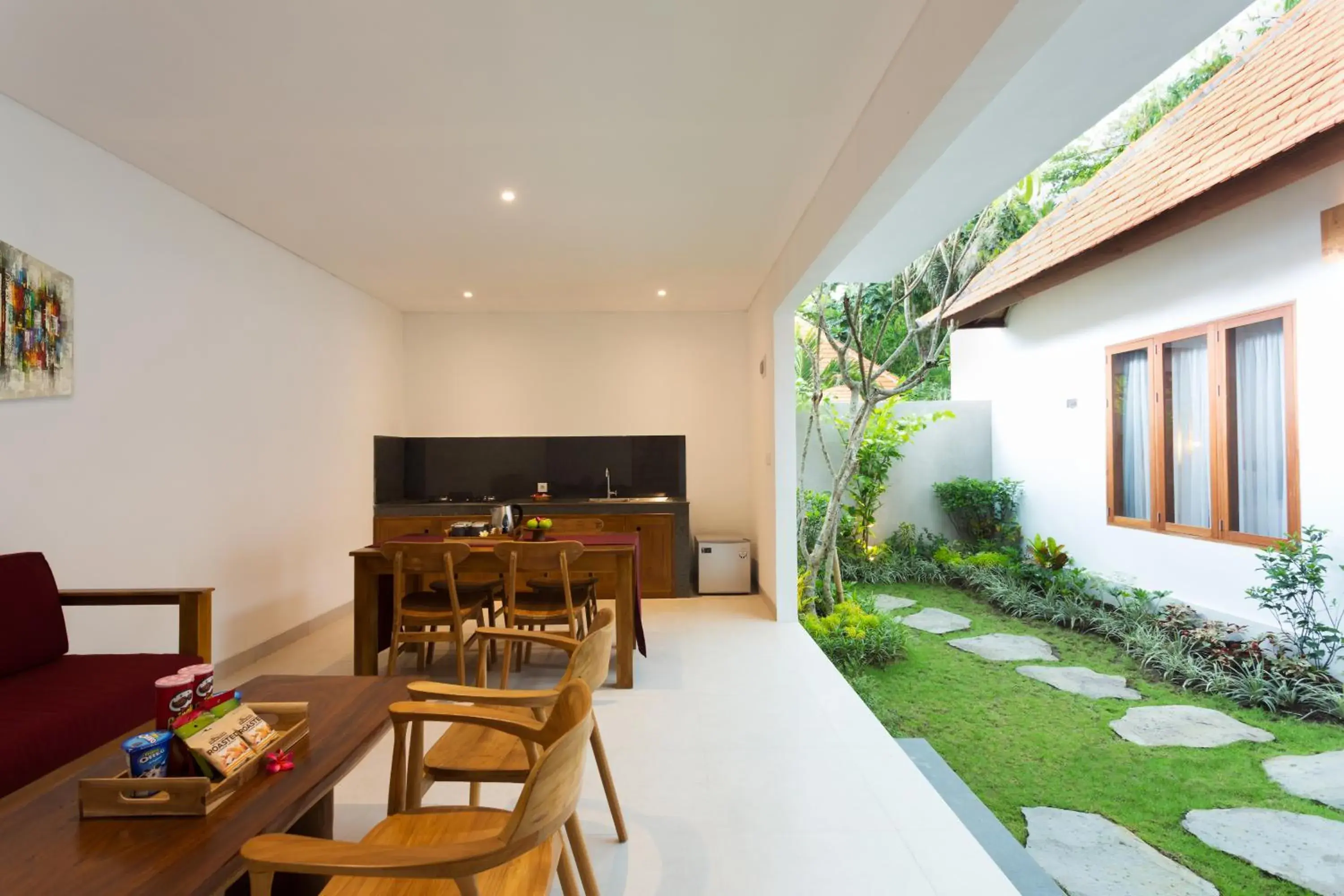 Living room in de Metra Villa Ubud by GenuineHost Living room in de Metra Villa Ubud by GenuineHost