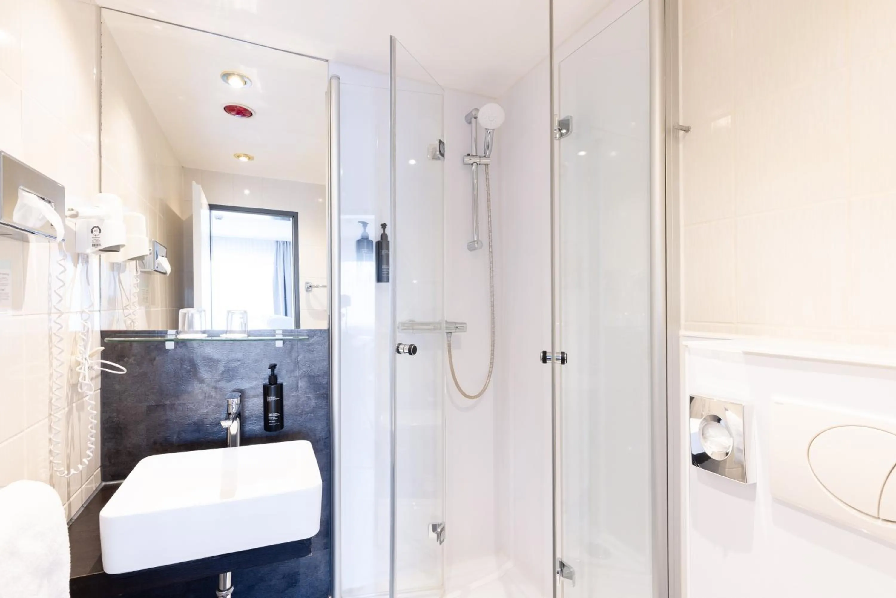 Bathroom in Garner Hotel Bremen North by IHG