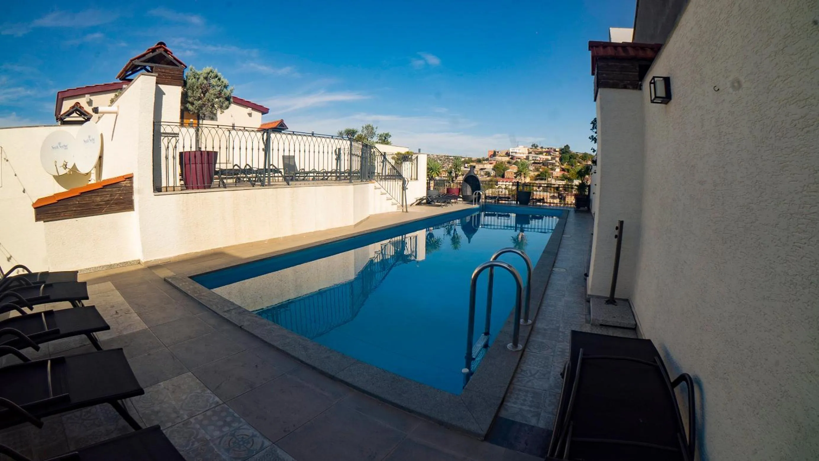 Swimming pool in TM Apart Hotel