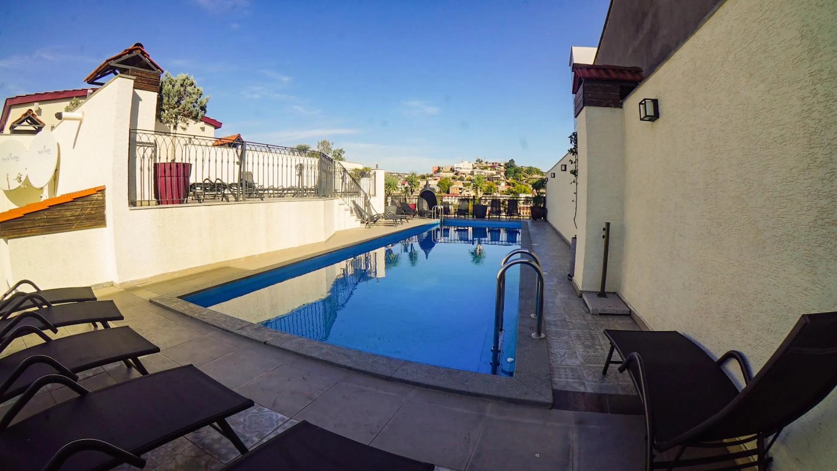 Swimming pool in TM Apart Hotel