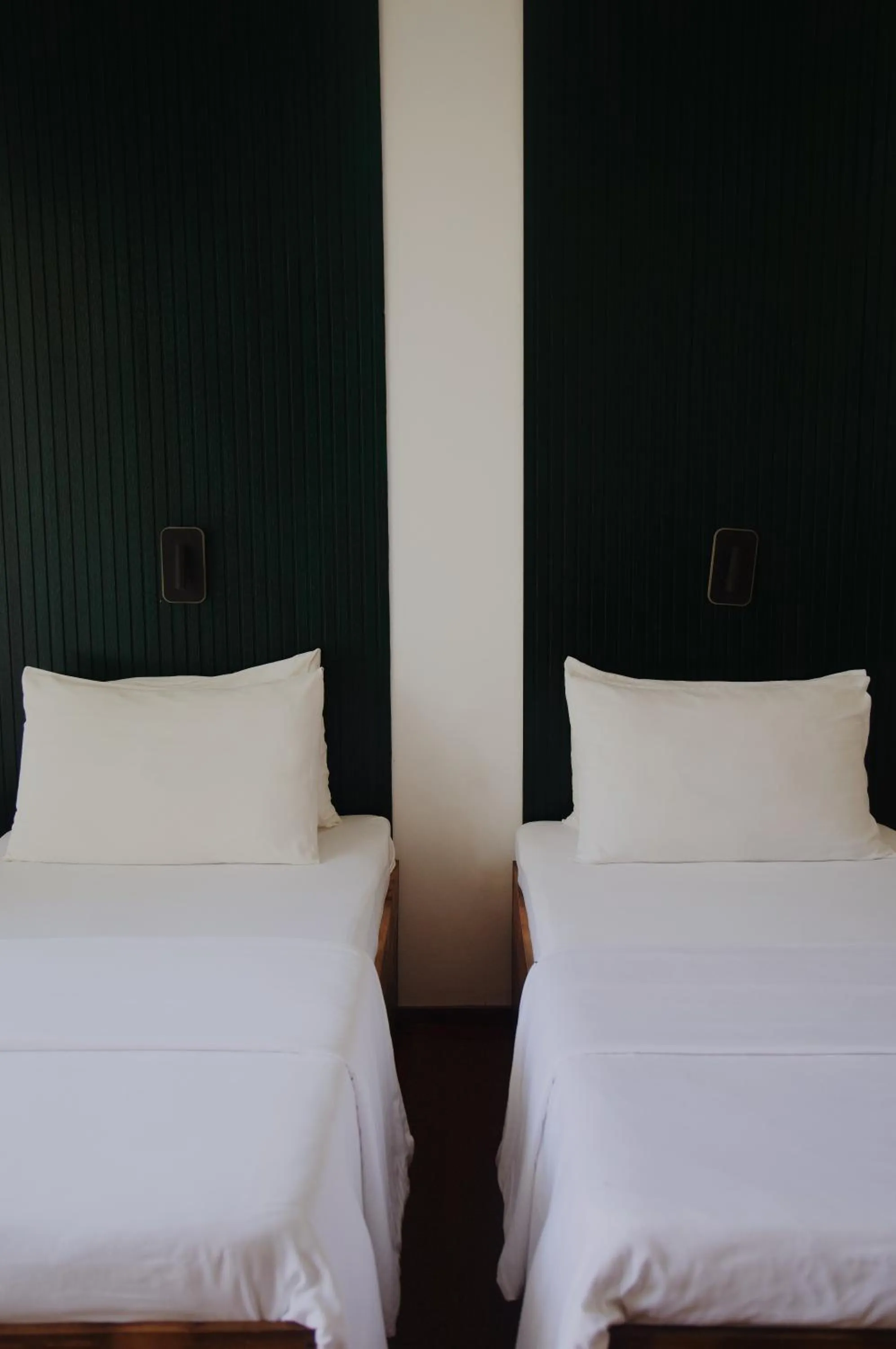 Bed in Palm Garden Ayurveda Resort