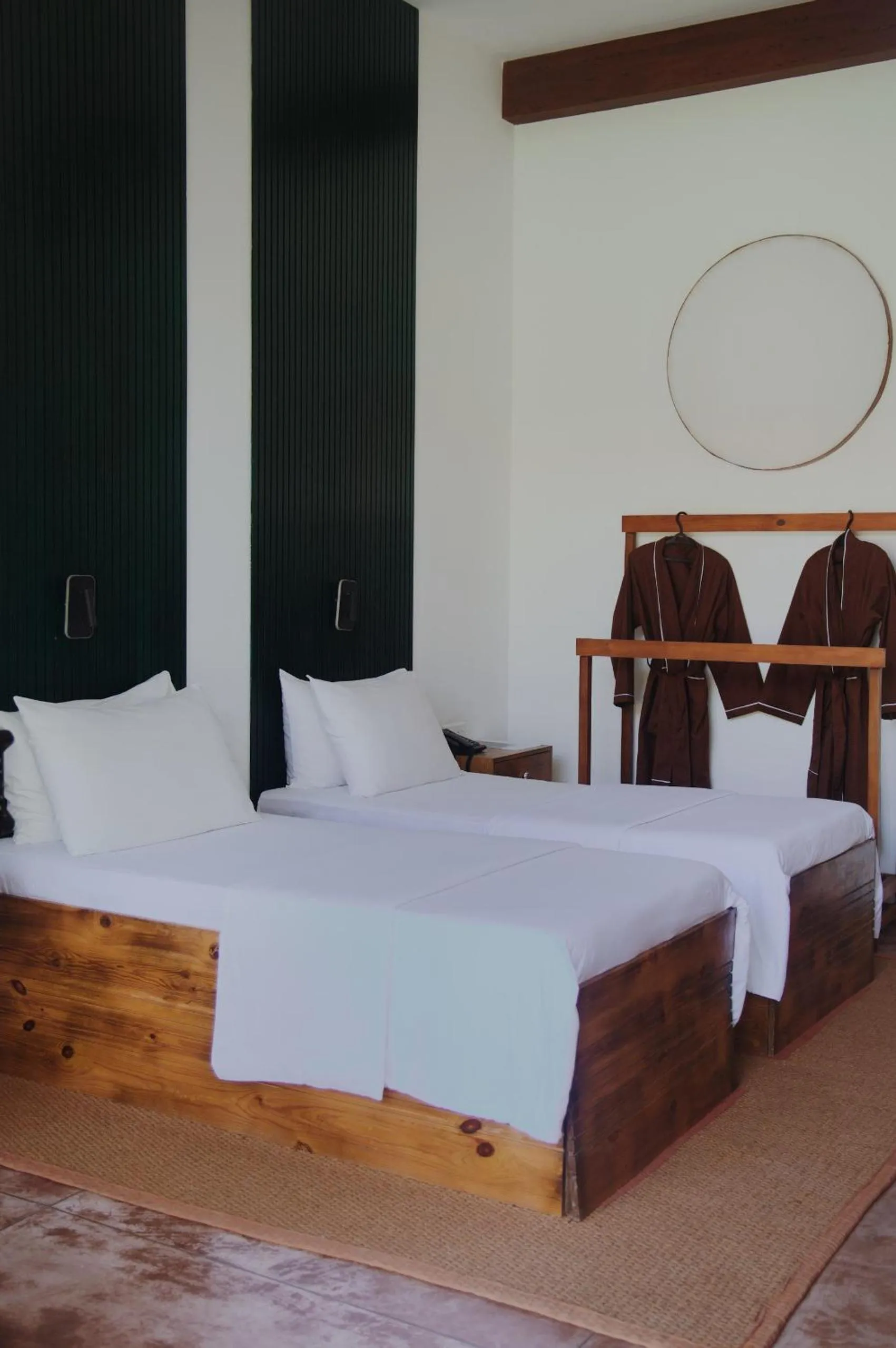 Bed in Palm Garden Ayurveda Resort