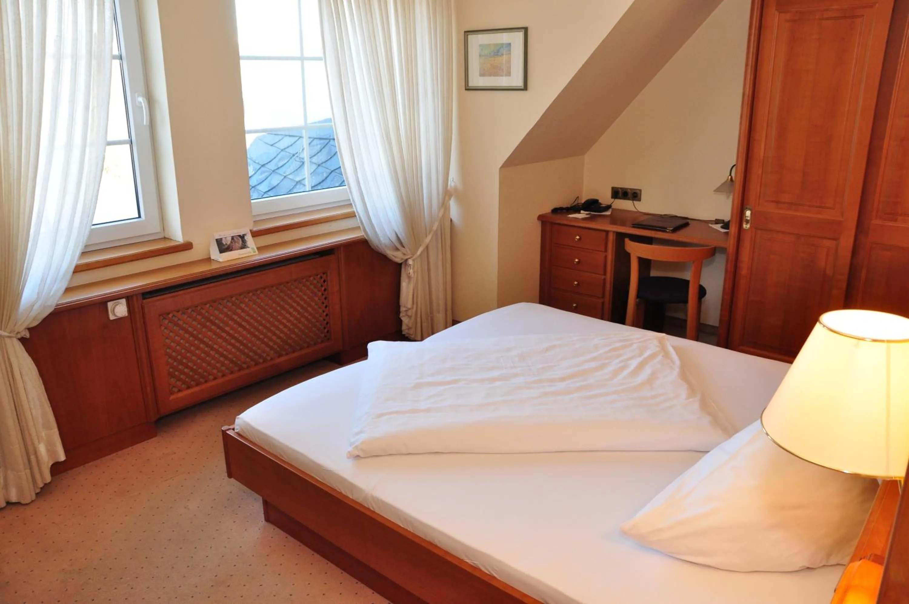 Photo of the whole room, Bed in Hotel Sauerländer Hof