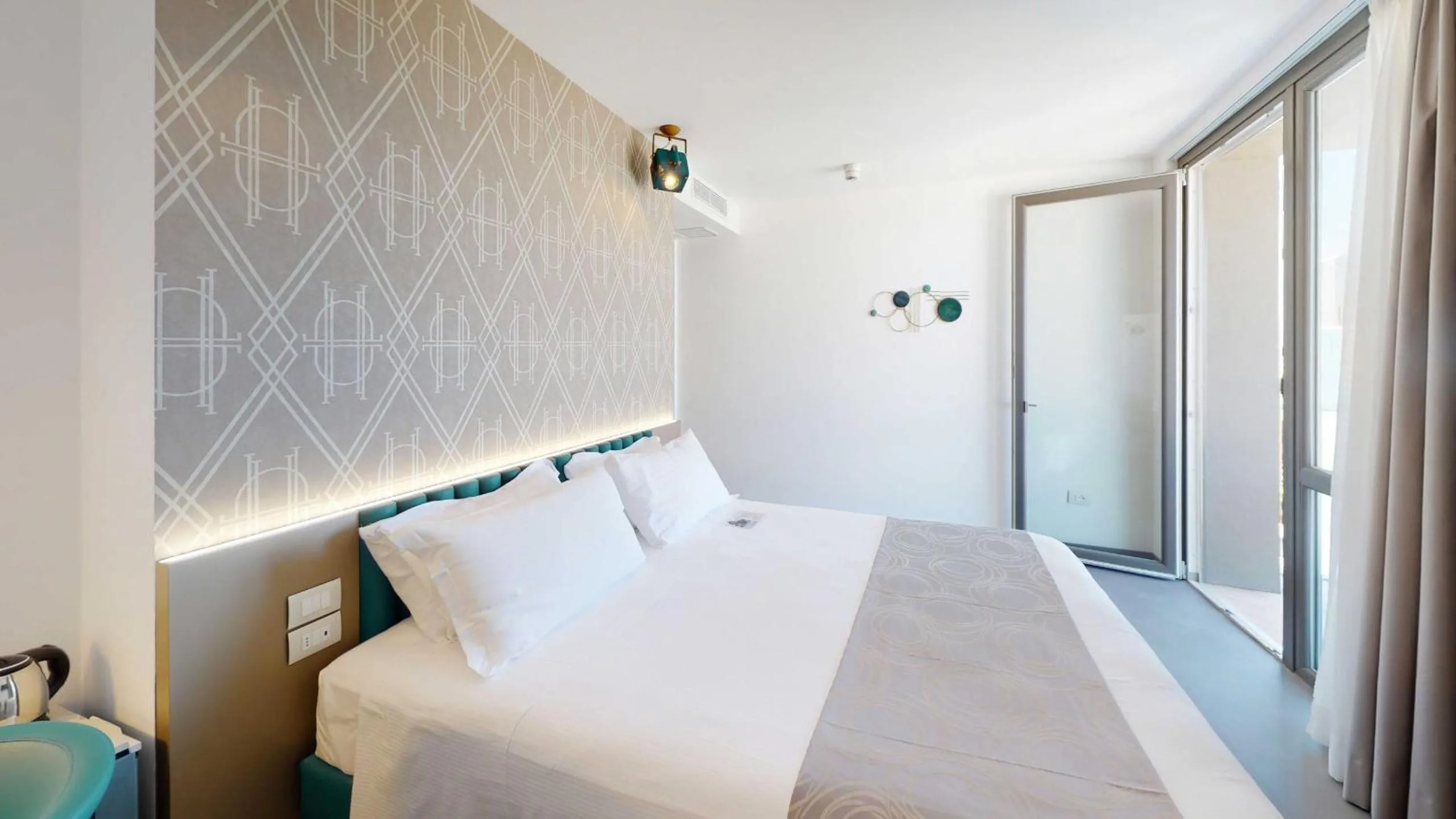 Bed in DIVA HOTEL LIGNANO - Adults Only