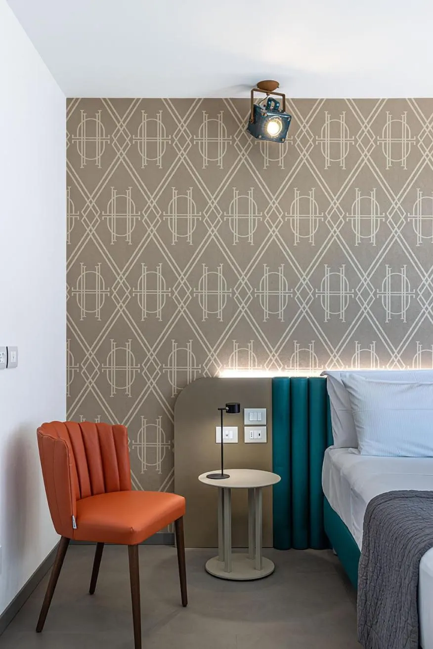 Bed in DIVA HOTEL LIGNANO - Adults Only