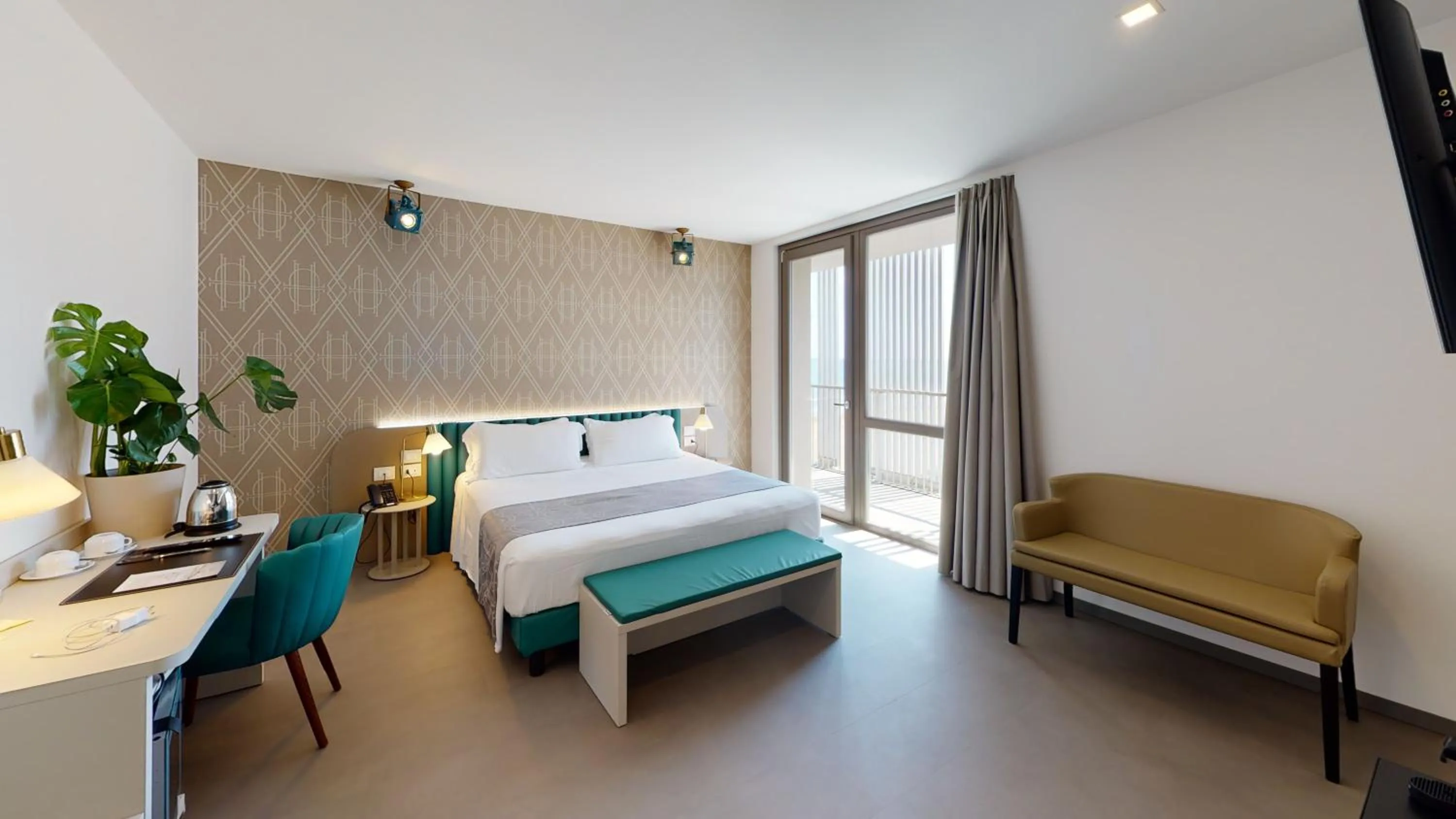 Photo of the whole room, Bed in DIVA HOTEL LIGNANO - Adults Only