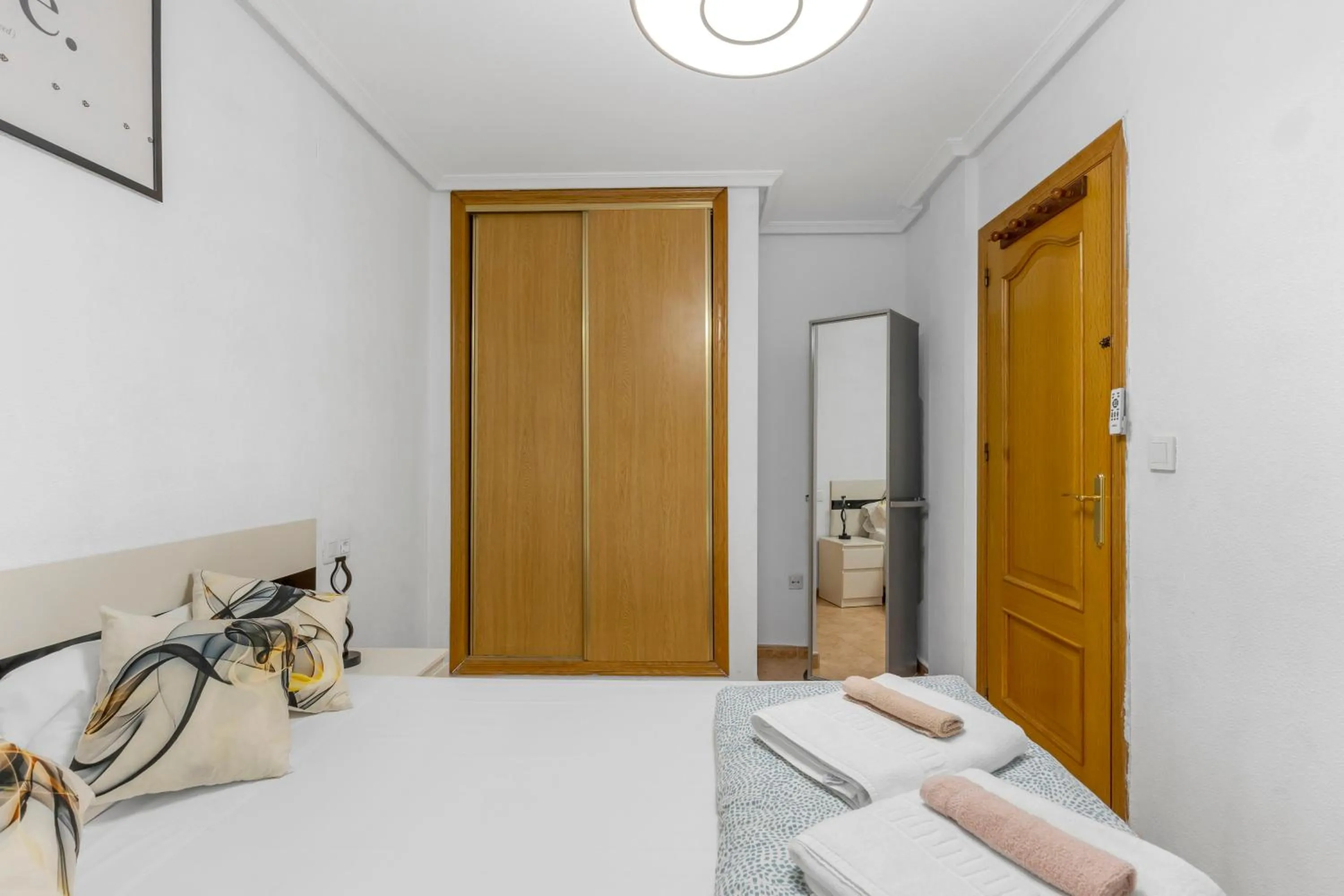 Bed in Homely Apartments Alcatri