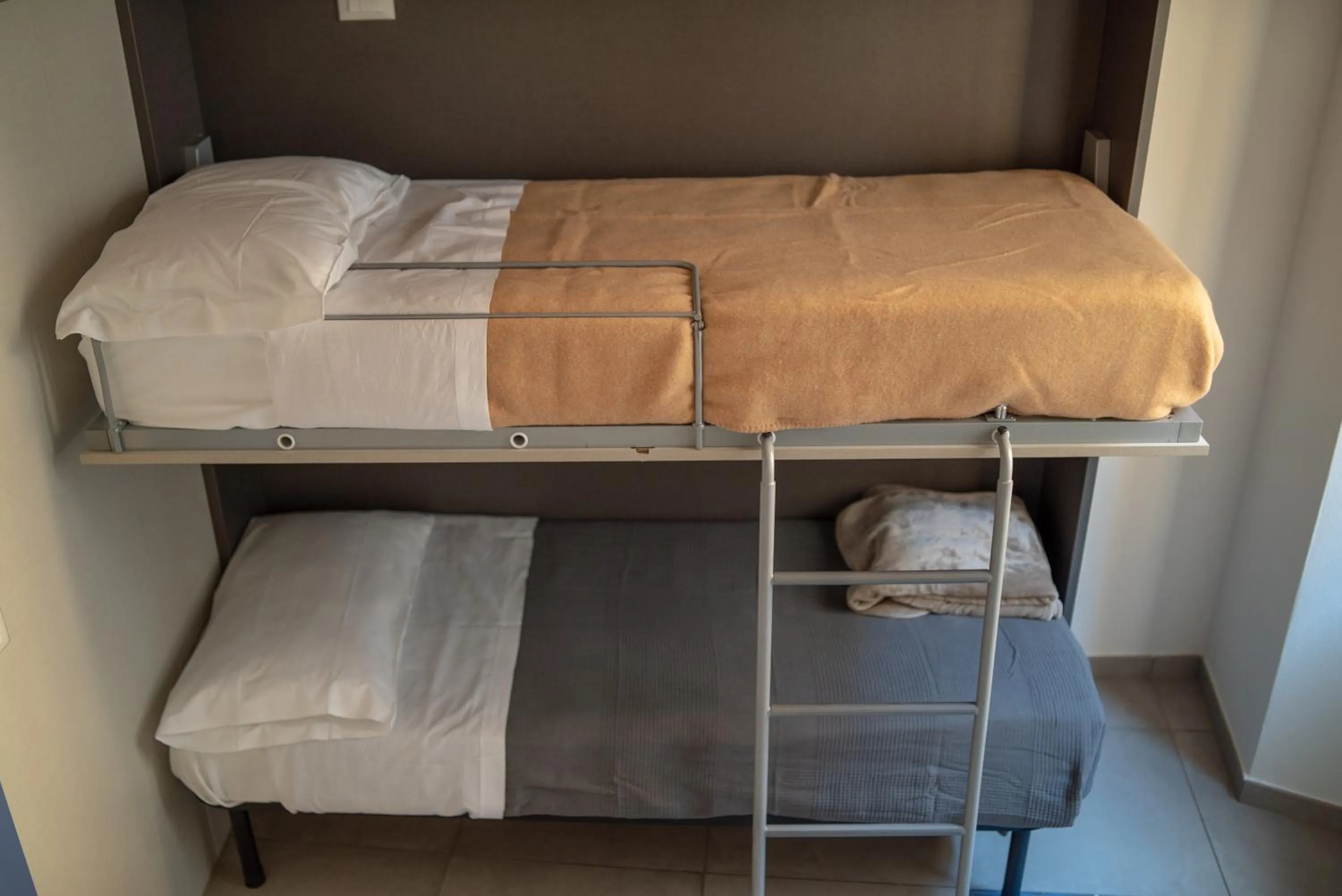 Bedroom in LUOGO COMUNE Ostello