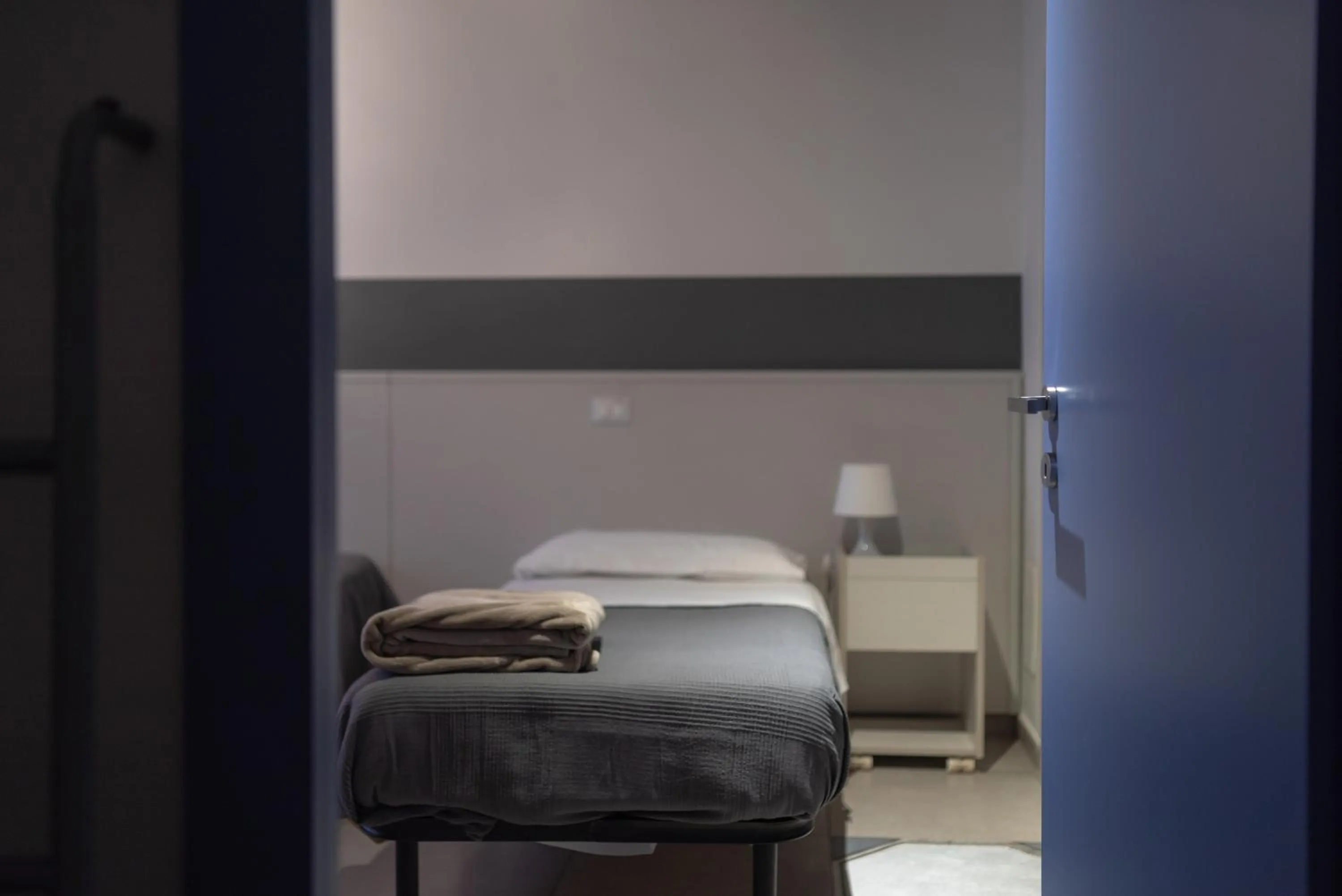 Bed in LUOGO COMUNE Ostello