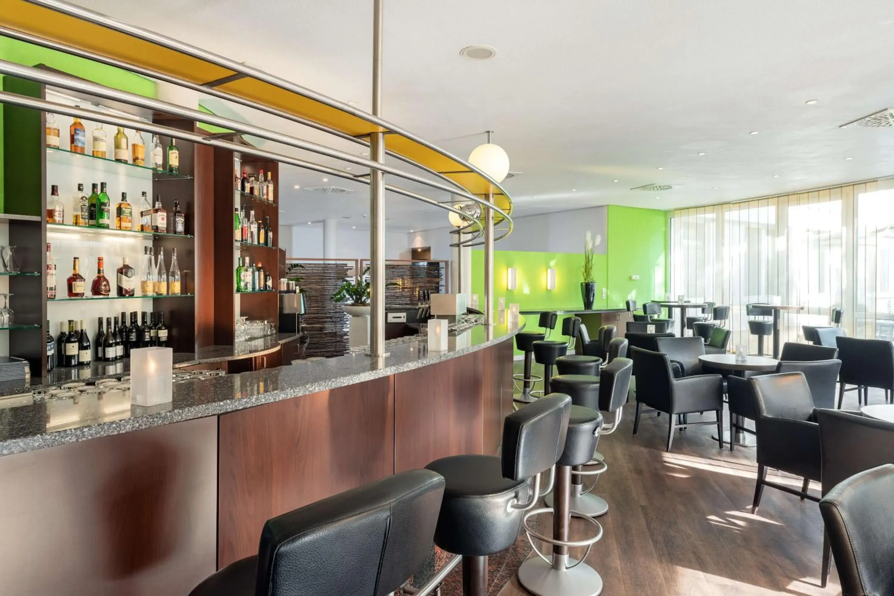Lounge or bar in NH Weinheim Lounge or bar in NH Weinheim