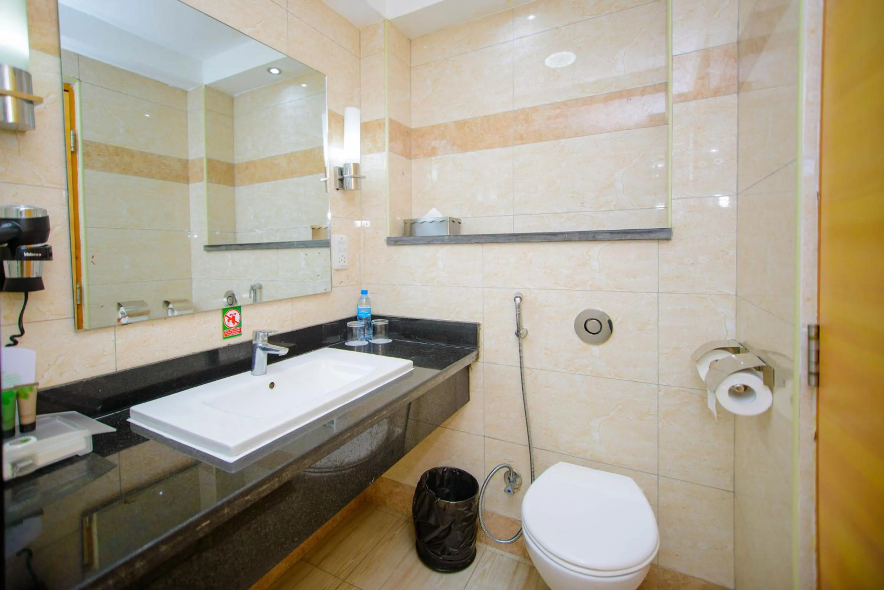 Toilet in Holiday Inn Dar Es Salaam by IHG