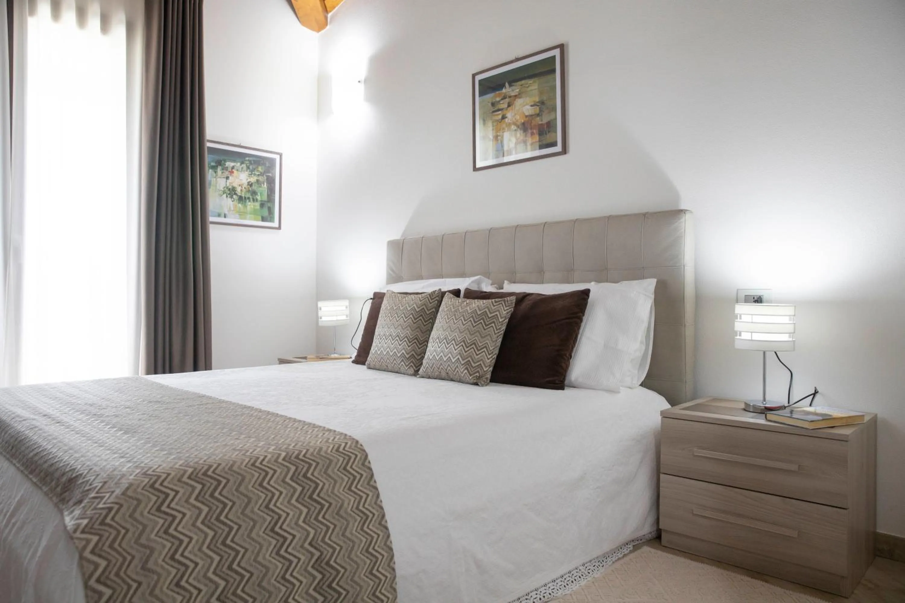 Bed in Irilor Luxury B&B