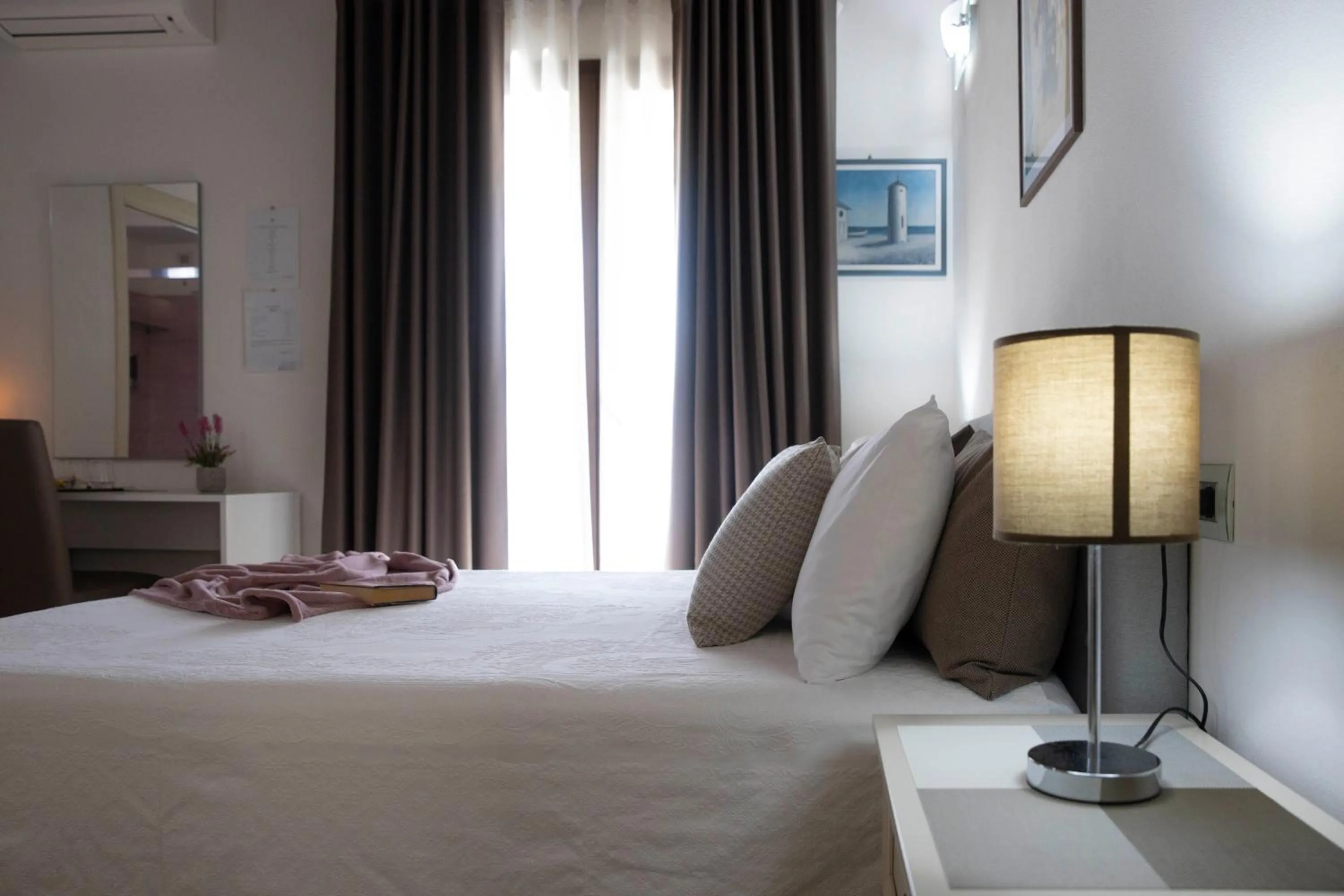 Bed in Irilor Luxury B&B