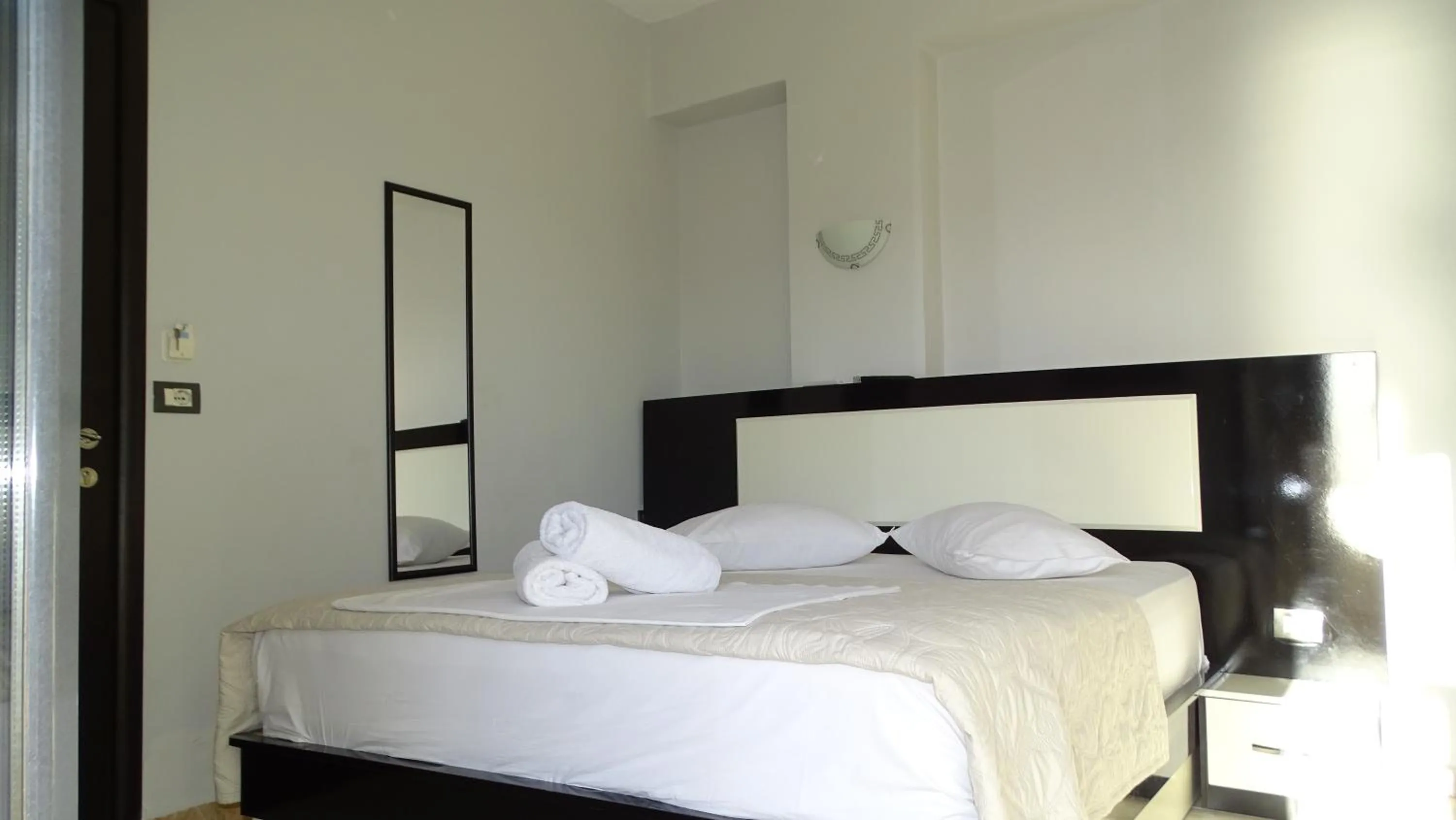 Bed in Hotel Ardiani