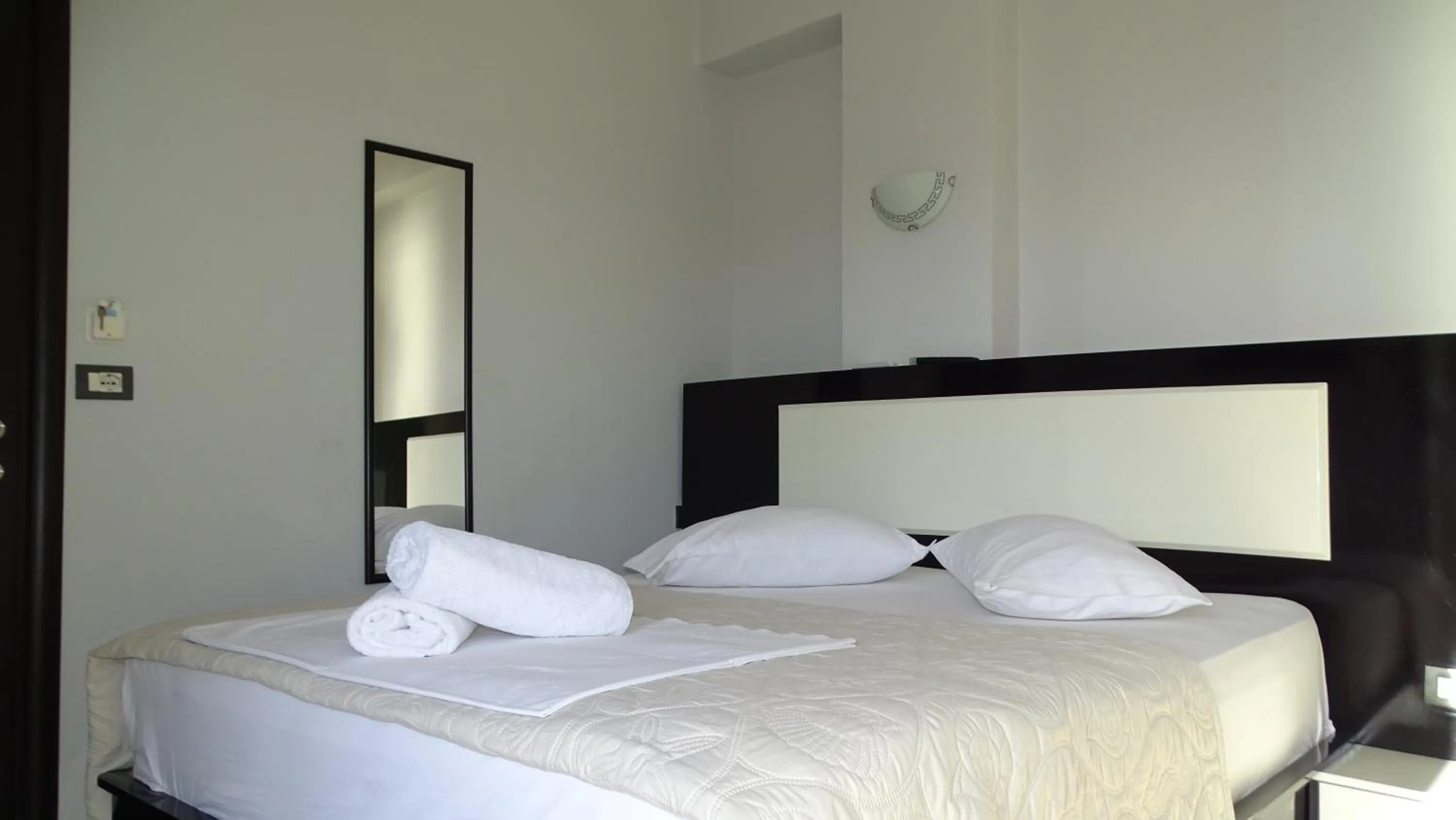 Bed in Hotel Ardiani