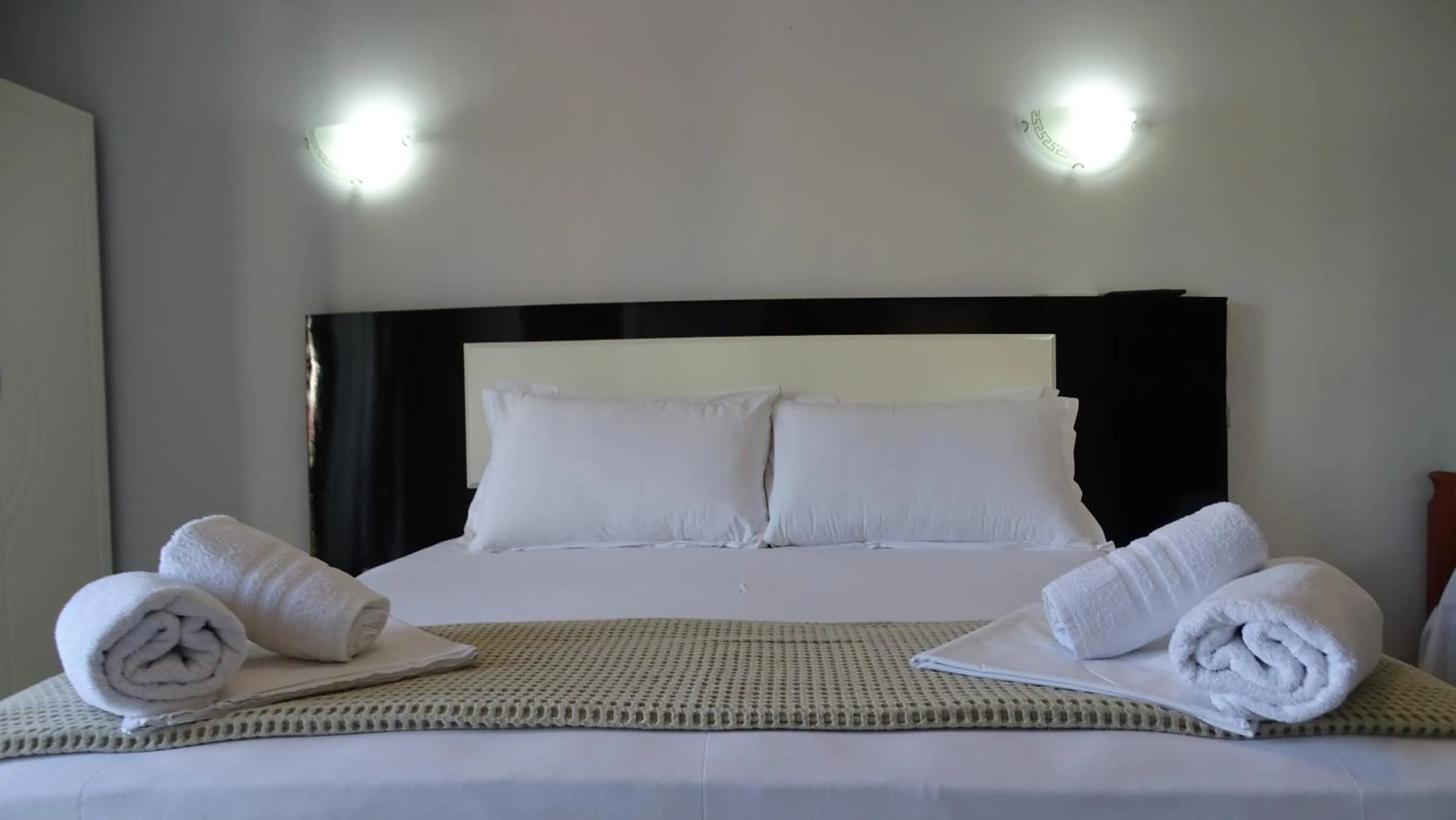 Bed in Hotel Ardiani