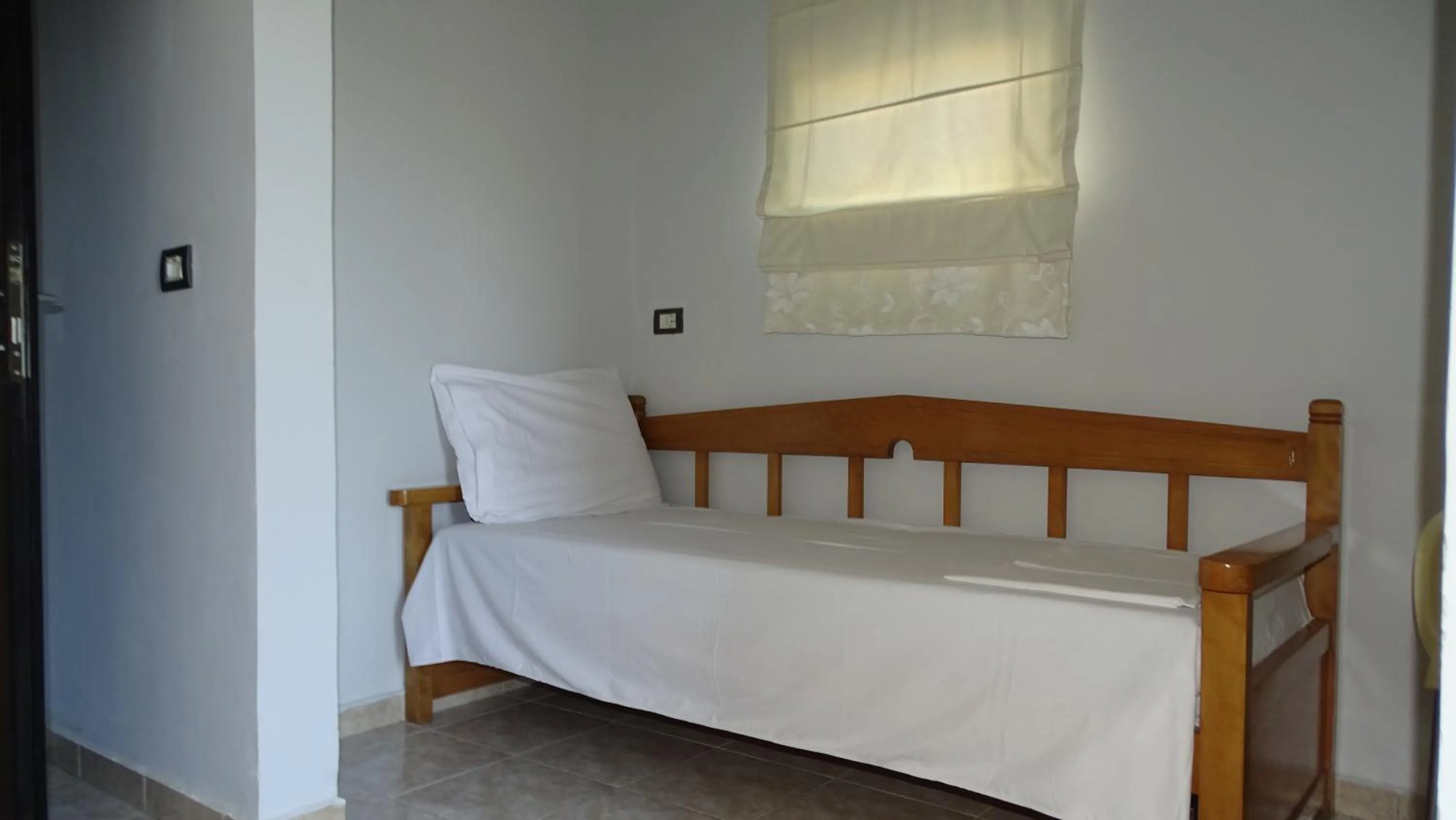 Bed in Hotel Ardiani